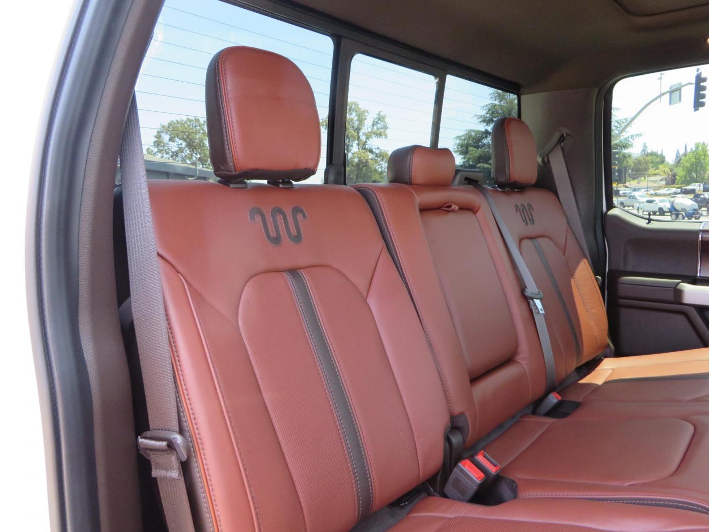 2021 White Ford F-450 SD King Ranch Crew Cab DRW 4WD (1FT8W4DT6ME) with an 6.7L V8 OHV 16V DIESEL engine, 6A transmission, located at 2630 Grass Valley Highway, Auburn, CA, 95603, (530) 508-5100, 38.937893, -121.095482 - Must see F450 King Ranch sitting on 37" Nitto Ridge Grappler tires wrapped around 22" American Force wheels, 2.5" King Remote reservoir Coilovers, King 2.5 adjustable shocks, King dual steering stabilizers, and window tint. - Photo#71