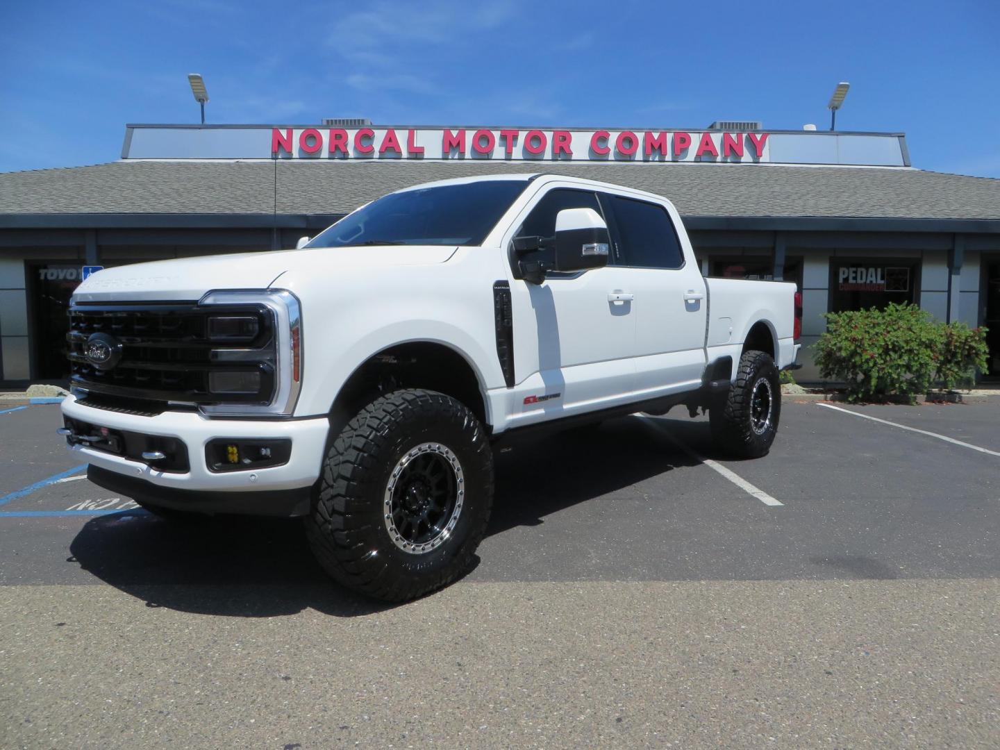 2024 White Ford F-250 SD Platinum Crew Cab 4WD (1FT8W2BM0RE) with an 6.7L V8 OHV 16V DIESEL engine, 6A transmission, located at 2630 Grass Valley Highway, Auburn, CA, 95603, (530) 508-5100, 38.937893, -121.095482 - Our Shop truck is ready for a new home. We installed a Carli 3.5" E-Venture suspension system, Torsion Sway Bar, Full Progressive Spring pack, Leaf Spring Shackles, Adjustable Radius Arms, High & Low Mount Steering Stabilizers, Long Travel Air Bags, Logiq HD2 Air compressor, Logiq Air Tank with chuc - Photo#0