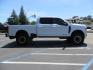 2024 White Ford F-250 SD Platinum Crew Cab 4WD (1FT8W2BM0RE) with an 6.7L V8 OHV 16V DIESEL engine, 6A transmission, located at 2630 Grass Valley Highway, Auburn, CA, 95603, (530) 508-5100, 38.937893, -121.095482 - Our Shop truck is ready for a new home. We installed a Carli 3.5" E-Venture suspension system, Torsion Sway Bar, Full Progressive Spring pack, Leaf Spring Shackles, Adjustable Radius Arms, High & Low Mount Steering Stabilizers, Long Travel Air Bags, Logiq HD2 Air compressor, Logiq Air Tank with chuc - Photo#3
