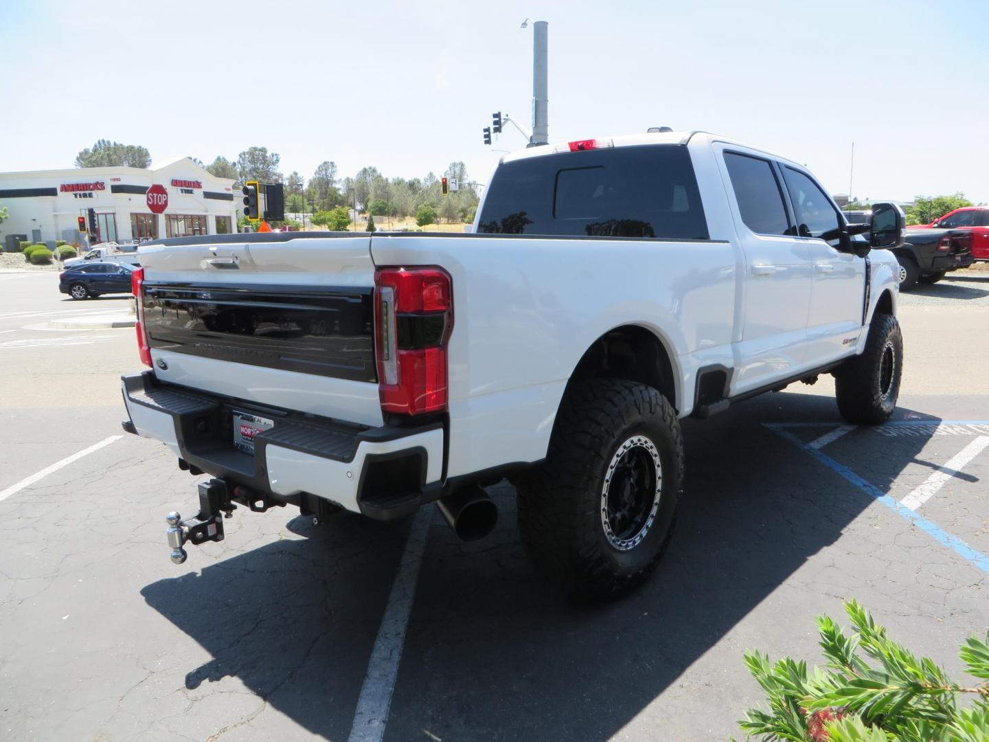 2024 White Ford F-250 SD Platinum Crew Cab 4WD (1FT8W2BM0RE) with an 6.7L V8 OHV 16V DIESEL engine, 6A transmission, located at 2630 Grass Valley Highway, Auburn, CA, 95603, (530) 508-5100, 38.937893, -121.095482 - Our Shop truck is ready for a new home. We installed a Carli 3.5" E-Venture suspension system, Torsion Sway Bar, Full Progressive Spring pack, Leaf Spring Shackles, Adjustable Radius Arms, High & Low Mount Steering Stabilizers, Long Travel Air Bags, Logiq HD2 Air compressor, Logiq Air Tank with chuc - Photo#4