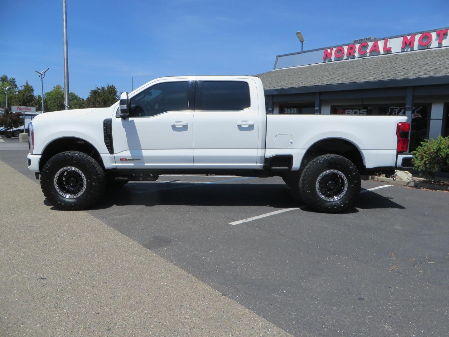 2024 White Ford F-250 SD Platinum Crew Cab 4WD (1FT8W2BM0RE) with an 6.7L V8 OHV 16V DIESEL engine, 6A transmission, located at 2630 Grass Valley Highway, Auburn, CA, 95603, (530) 508-5100, 38.937893, -121.095482 - Our Shop truck is ready for a new home. We installed a Carli 3.5" E-Venture suspension system, Torsion Sway Bar, Full Progressive Spring pack, Leaf Spring Shackles, Adjustable Radius Arms, High & Low Mount Steering Stabilizers, Long Travel Air Bags, Logiq HD2 Air compressor, Logiq Air Tank with chuc - Photo#7