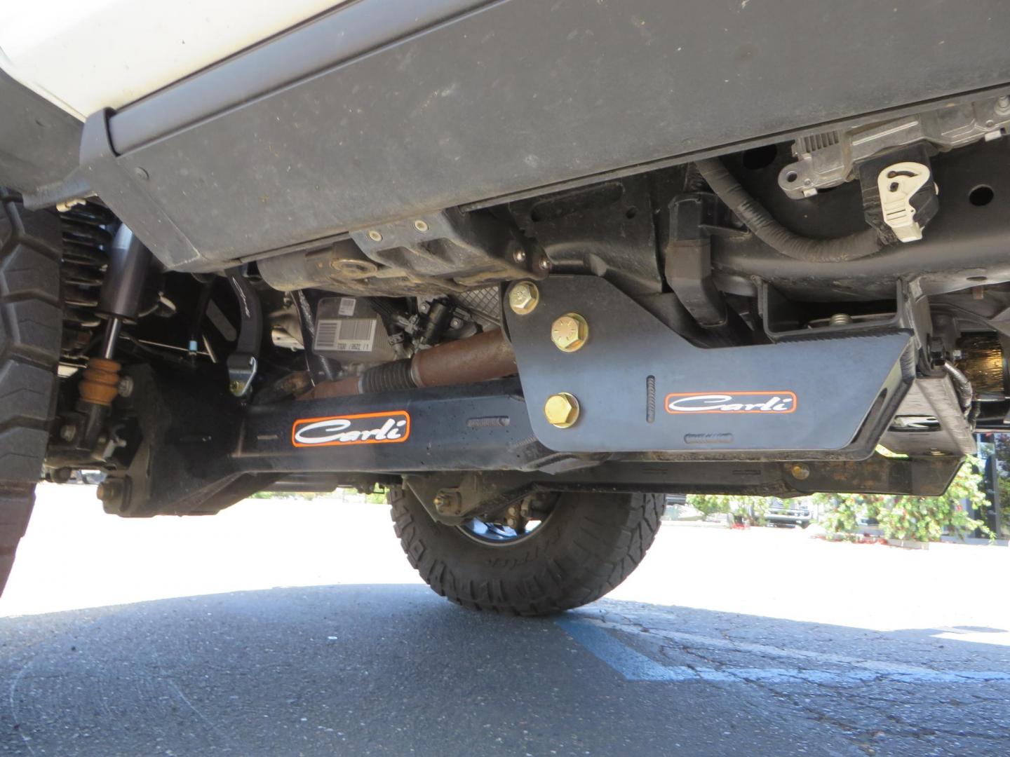 2024 White Ford F-250 SD Platinum Crew Cab 4WD (1FT8W2BM0RE) with an 6.7L V8 OHV 16V DIESEL engine, 6A transmission, located at 2630 Grass Valley Highway, Auburn, CA, 95603, (530) 508-5100, 38.937893, -121.095482 - Our Shop truck is ready for a new home. We installed a Carli 3.5" E-Venture suspension system, Torsion Sway Bar, Full Progressive Spring pack, Leaf Spring Shackles, Adjustable Radius Arms, High & Low Mount Steering Stabilizers, Long Travel Air Bags, Logiq HD2 Air compressor, Logiq Air Tank with chuc - Photo#12