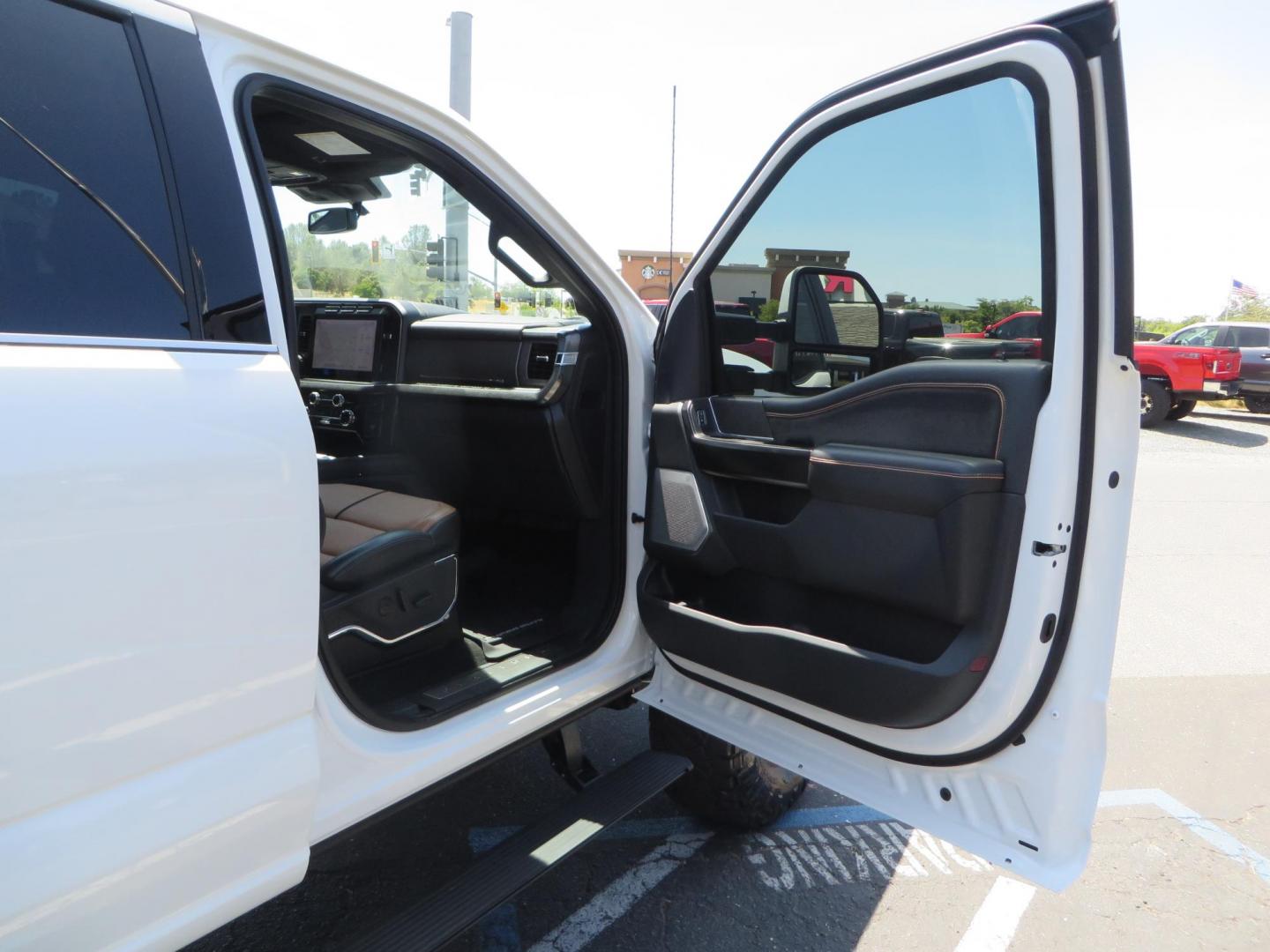 2024 White Ford F-250 SD Platinum Crew Cab 4WD (1FT8W2BM0RE) with an 6.7L V8 OHV 16V DIESEL engine, 6A transmission, located at 2630 Grass Valley Highway, Auburn, CA, 95603, (530) 508-5100, 38.937893, -121.095482 - Our Shop truck is ready for a new home. We installed a Carli 3.5" E-Venture suspension system, Torsion Sway Bar, Full Progressive Spring pack, Leaf Spring Shackles, Adjustable Radius Arms, High & Low Mount Steering Stabilizers, Long Travel Air Bags, Logiq HD2 Air compressor, Logiq Air Tank with chuc - Photo#82