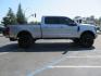 2022 SILVER /BLACK Ford F-250 SD Lariat Crew Cab 4WD (1FT8W2BT6NE) with an 6.7L V8 OHV 16V DIESEL engine, 6A transmission, located at 2630 Grass Valley Highway, Auburn, CA, 95603, (530) 508-5100, 38.937893, -121.095482 - Dont miss this F-250 sitting on a Carli Back Country suspension system, Fox remote reservoir shocks, Radius arms, Deaver rear springs, Torsion sway bar, upper and lower stabilizers, 37" Toyo RT Trail tires, 17" Innov8 G500 wheels, Baja Designs Fog light kit, Diamondback bedcover, Bed Molle panels, - Photo#5