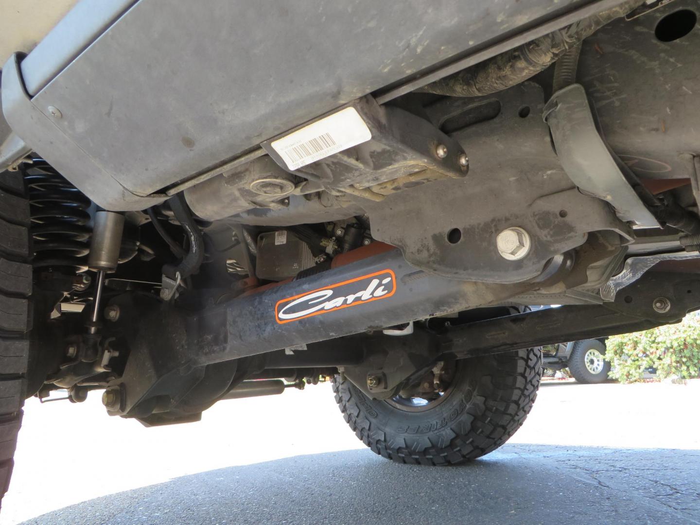 2022 SILVER /BLACK Ford F-250 SD Lariat Crew Cab 4WD (1FT8W2BT6NE) with an 6.7L V8 OHV 16V DIESEL engine, 6A transmission, located at 2630 Grass Valley Highway, Auburn, CA, 95603, (530) 508-5100, 38.937893, -121.095482 - Dont miss this F-250 sitting on a Carli Back Country suspension system, Fox remote reservoir shocks, Radius arms, Deaver rear springs, Torsion sway bar, upper and lower stabilizers, 37" Toyo RT Trail tires, 17" Innov8 G500 wheels, Baja Designs Fog light kit, Diamondback bedcover, Bed Molle panels, - Photo#11