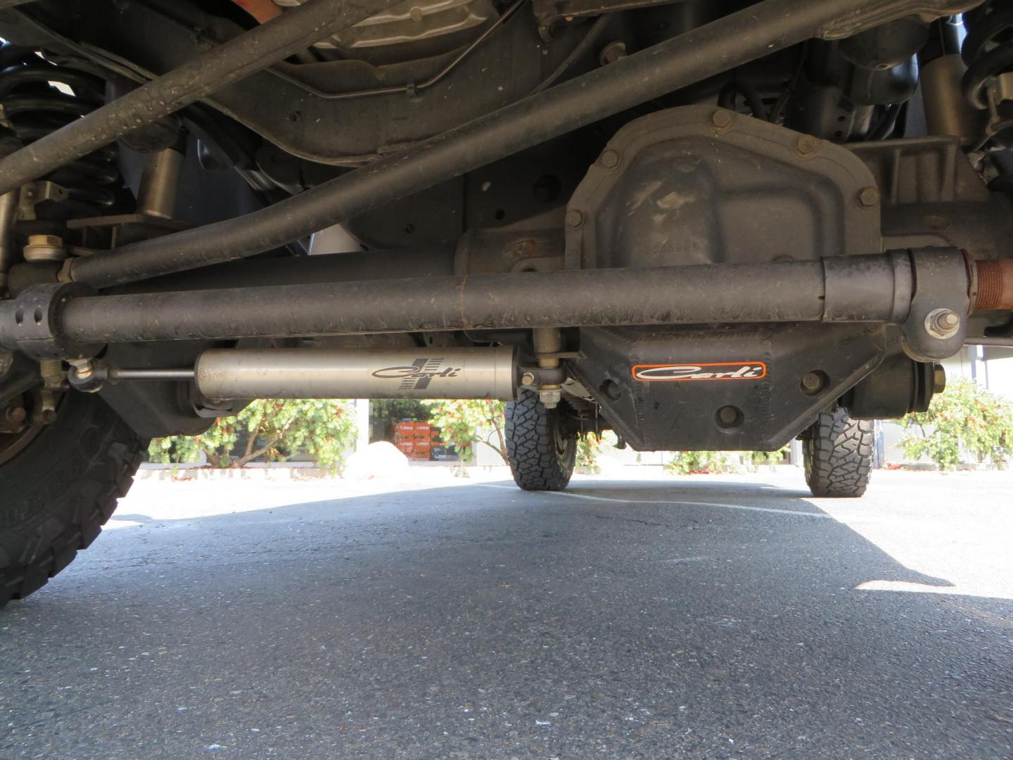 2022 SILVER /BLACK Ford F-250 SD Lariat Crew Cab 4WD (1FT8W2BT6NE) with an 6.7L V8 OHV 16V DIESEL engine, 6A transmission, located at 2630 Grass Valley Highway, Auburn, CA, 95603, (530) 508-5100, 38.937893, -121.095482 - Dont miss this F-250 sitting on a Carli Back Country suspension system, Fox remote reservoir shocks, Radius arms, Deaver rear springs, Torsion sway bar, upper and lower stabilizers, 37" Toyo RT Trail tires, 17" Innov8 G500 wheels, Baja Designs Fog light kit, Diamondback bedcover, Bed Molle panels, - Photo#15
