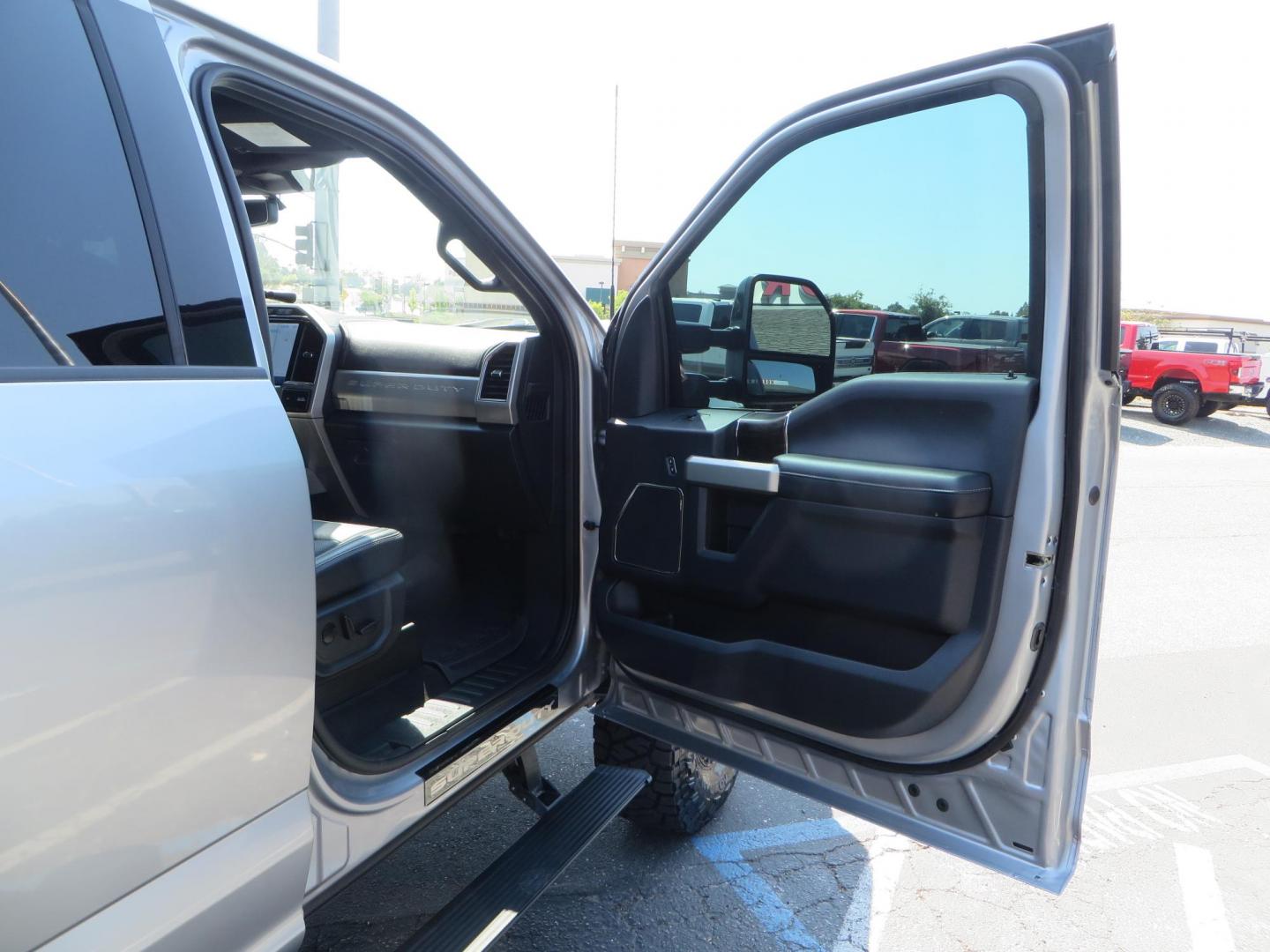 2022 SILVER /BLACK Ford F-250 SD Lariat Crew Cab 4WD (1FT8W2BT6NE) with an 6.7L V8 OHV 16V DIESEL engine, 6A transmission, located at 2630 Grass Valley Highway, Auburn, CA, 95603, (530) 508-5100, 38.937893, -121.095482 - Dont miss this F-250 sitting on a Carli Back Country suspension system, Fox remote reservoir shocks, Radius arms, Deaver rear springs, Torsion sway bar, upper and lower stabilizers, 37" Toyo RT Trail tires, 17" Innov8 G500 wheels, Baja Designs Fog light kit, Diamondback bedcover, Bed Molle panels, - Photo#60