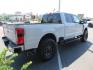 2025 Gray /Black Ford F-350 SD Lariat Crew Cab Short Bed 4WD (1FT8W3BM5SE) with an 6.7L V8 OHV 16V DIESEL engine, 6A transmission, located at 2630 Grass Valley Highway, Auburn, CA, 95603, (530) 508-5100, 38.937893, -121.095482 - Features a Readylift level kit, Falcon shocks, 20" Fuel Triton wheels, and 37" Nitto Ridge Grappler tires. - Photo#4