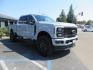 2025 Gray /Black Ford F-350 SD Lariat Crew Cab Short Bed 4WD (1FT8W3BM5SE) with an 6.7L V8 OHV 16V DIESEL engine, 6A transmission, located at 2630 Grass Valley Highway, Auburn, CA, 95603, (530) 508-5100, 38.937893, -121.095482 - Features a Readylift level kit, Falcon shocks, 20" Fuel Triton wheels, and 37" Nitto Ridge Grappler tires. - Photo#6