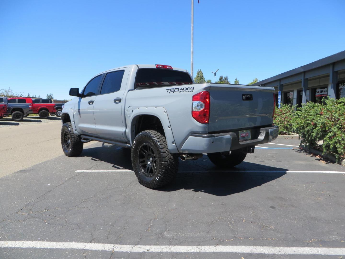 2018 Gray /Black Toyota Tundra SR5 5.7L V8 CrewMax 4WD (5TFDY5F15JX) with an 5.7L V8 DOHC 32V engine, 6A transmission, located at 2630 Grass Valley Highway, Auburn, CA, 95603, (530) 508-5100, 38.937893, -121.095482 - Lifted Tundra sitting on a Pro Comp 6" Lift kit, 37" Nitto Ridge Grappler tires, 20" Fuel Recoil wheels, N-Fab running boards, Grille Mounted Light Bar, Bilstein 5100 rear shocks, TRD dual exhaust, Fender Flarew, and window tint. - Photo#2