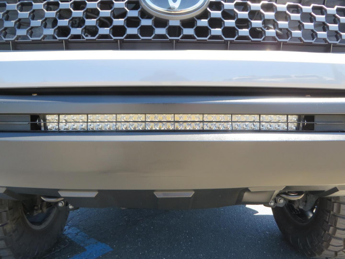 2018 Gray /Black Toyota Tundra SR5 5.7L V8 CrewMax 4WD (5TFDY5F15JX) with an 5.7L V8 DOHC 32V engine, 6A transmission, located at 2630 Grass Valley Highway, Auburn, CA, 95603, (530) 508-5100, 38.937893, -121.095482 - Lifted Tundra sitting on a Pro Comp 6" Lift kit, 37" Nitto Ridge Grappler tires, 20" Fuel Recoil wheels, N-Fab running boards, Grille Mounted Light Bar, Bilstein 5100 rear shocks, TRD dual exhaust, Fender Flarew, and window tint. - Photo#12