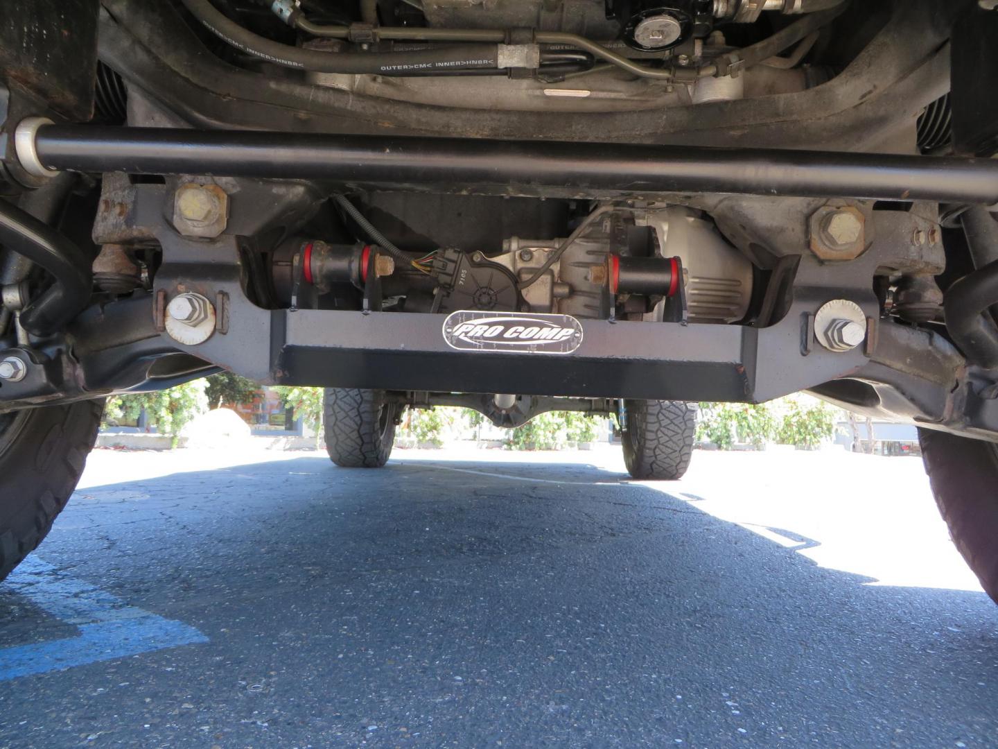 2018 Gray /Black Toyota Tundra SR5 5.7L V8 CrewMax 4WD (5TFDY5F15JX) with an 5.7L V8 DOHC 32V engine, 6A transmission, located at 2630 Grass Valley Highway, Auburn, CA, 95603, (530) 508-5100, 38.937893, -121.095482 - Lifted Tundra sitting on a Pro Comp 6" Lift kit, 37" Nitto Ridge Grappler tires, 20" Fuel Recoil wheels, N-Fab running boards, Grille Mounted Light Bar, Bilstein 5100 rear shocks, TRD dual exhaust, Fender Flarew, and window tint. - Photo#11