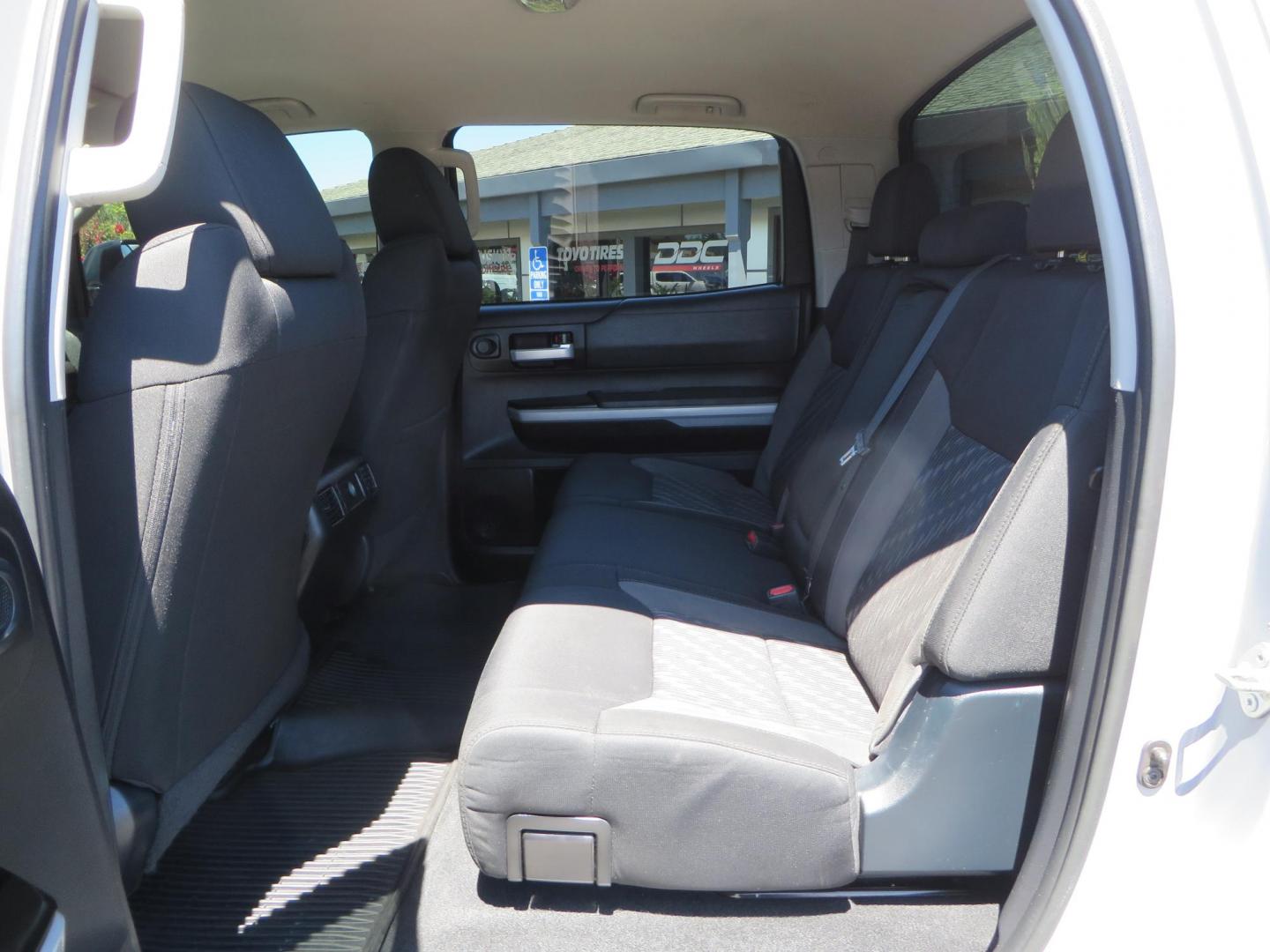 2018 Gray /Black Toyota Tundra SR5 5.7L V8 CrewMax 4WD (5TFDY5F15JX) with an 5.7L V8 DOHC 32V engine, 6A transmission, located at 2630 Grass Valley Highway, Auburn, CA, 95603, (530) 508-5100, 38.937893, -121.095482 - Lifted Tundra sitting on a Pro Comp 6" Lift kit, 37" Nitto Ridge Grappler tires, 20" Fuel Recoil wheels, N-Fab running boards, Grille Mounted Light Bar, Bilstein 5100 rear shocks, TRD dual exhaust, Fender Flarew, and window tint. - Photo#39