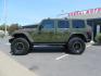 2021 Green Jeep Wrangler Unlimited Rubicon (1C4JJXFM1MW) with an 3.0L V6 DOHC 24V TURBO DIESEL engine, 6A transmission, located at 2630 Grass Valley Highway, Auburn, CA, 95603, (530) 508-5100, 38.937893, -121.095482 - Mopar lifted Diesel Rubicon with Fox shocks, HD tire carrier, Amp Power steps, Roof Rack, and color matched simulated beadlock rings. - Photo#1