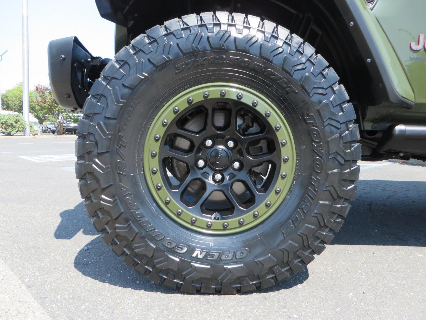 2021 Green Jeep Wrangler Unlimited Rubicon (1C4JJXFM1MW) with an 3.0L V6 DOHC 24V TURBO DIESEL engine, 6A transmission, located at 2630 Grass Valley Highway, Auburn, CA, 95603, (530) 508-5100, 38.937893, -121.095482 - Mopar lifted Diesel Rubicon with Fox shocks, HD tire carrier, Amp Power steps, Roof Rack, and color matched simulated beadlock rings. - Photo#8