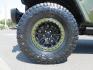 2021 Green Jeep Wrangler Unlimited Rubicon (1C4JJXFM1MW) with an 3.0L V6 DOHC 24V TURBO DIESEL engine, 6A transmission, located at 2630 Grass Valley Highway, Auburn, CA, 95603, (530) 508-5100, 38.937893, -121.095482 - Mopar lifted Diesel Rubicon with Fox shocks, HD tire carrier, Amp Power steps, Roof Rack, and color matched simulated beadlock rings. - Photo#8