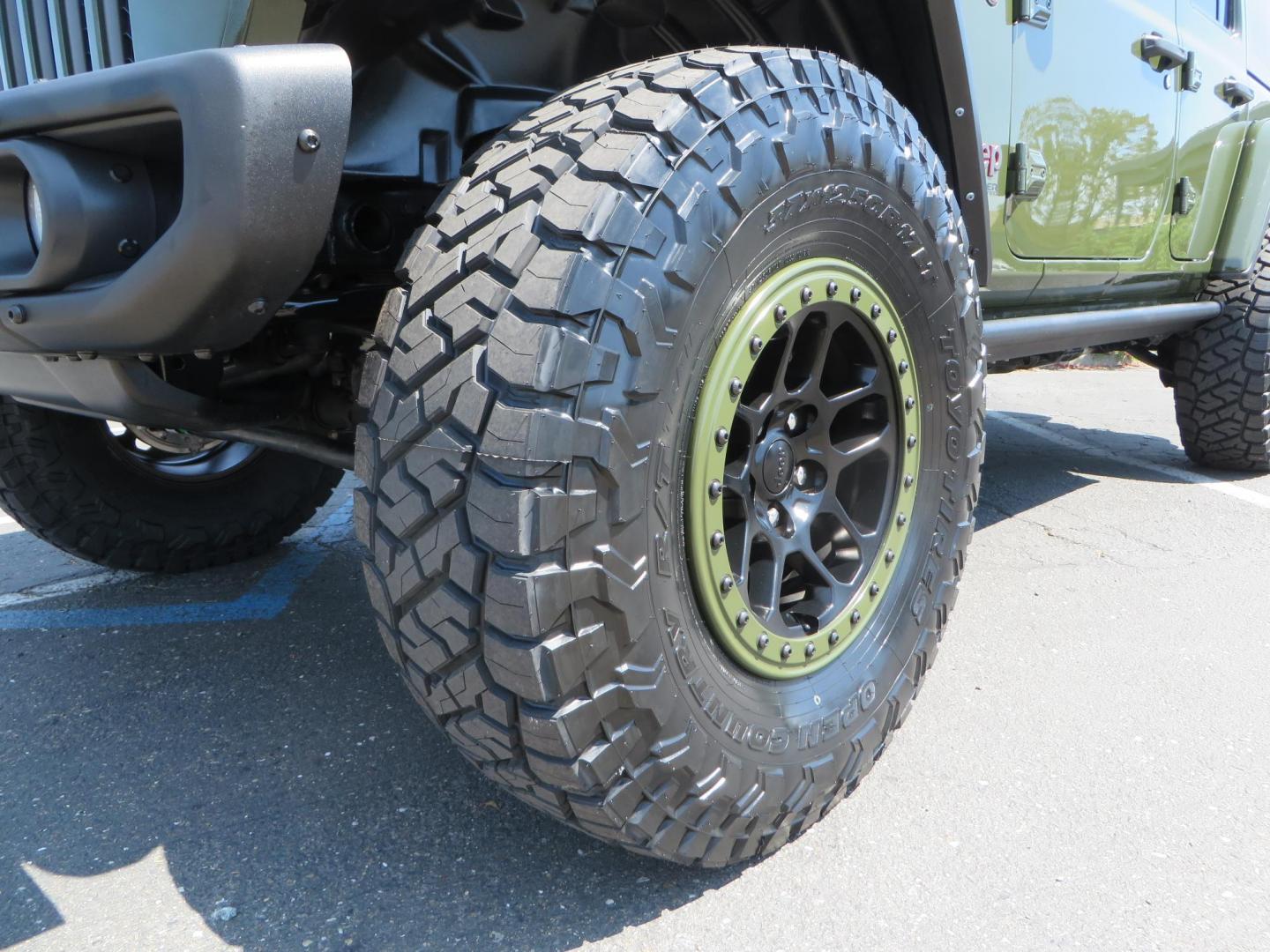 2021 Green Jeep Wrangler Unlimited Rubicon (1C4JJXFM1MW) with an 3.0L V6 DOHC 24V TURBO DIESEL engine, 6A transmission, located at 2630 Grass Valley Highway, Auburn, CA, 95603, (530) 508-5100, 38.937893, -121.095482 - Mopar lifted Diesel Rubicon with Fox shocks, HD tire carrier, Amp Power steps, Roof Rack, and color matched simulated beadlock rings. - Photo#9