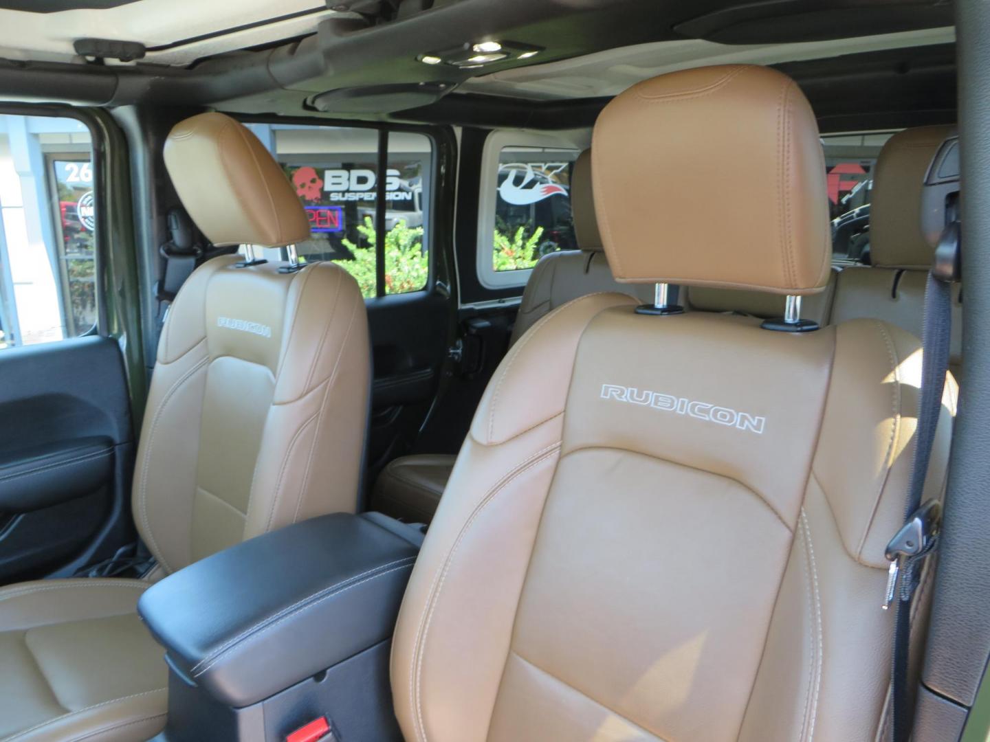 2021 Green Jeep Wrangler Unlimited Rubicon (1C4JJXFM1MW) with an 3.0L V6 DOHC 24V TURBO DIESEL engine, 6A transmission, located at 2630 Grass Valley Highway, Auburn, CA, 95603, (530) 508-5100, 38.937893, -121.095482 - Mopar lifted Diesel Rubicon with Fox shocks, HD tire carrier, Amp Power steps, Roof Rack, and color matched simulated beadlock rings. - Photo#22