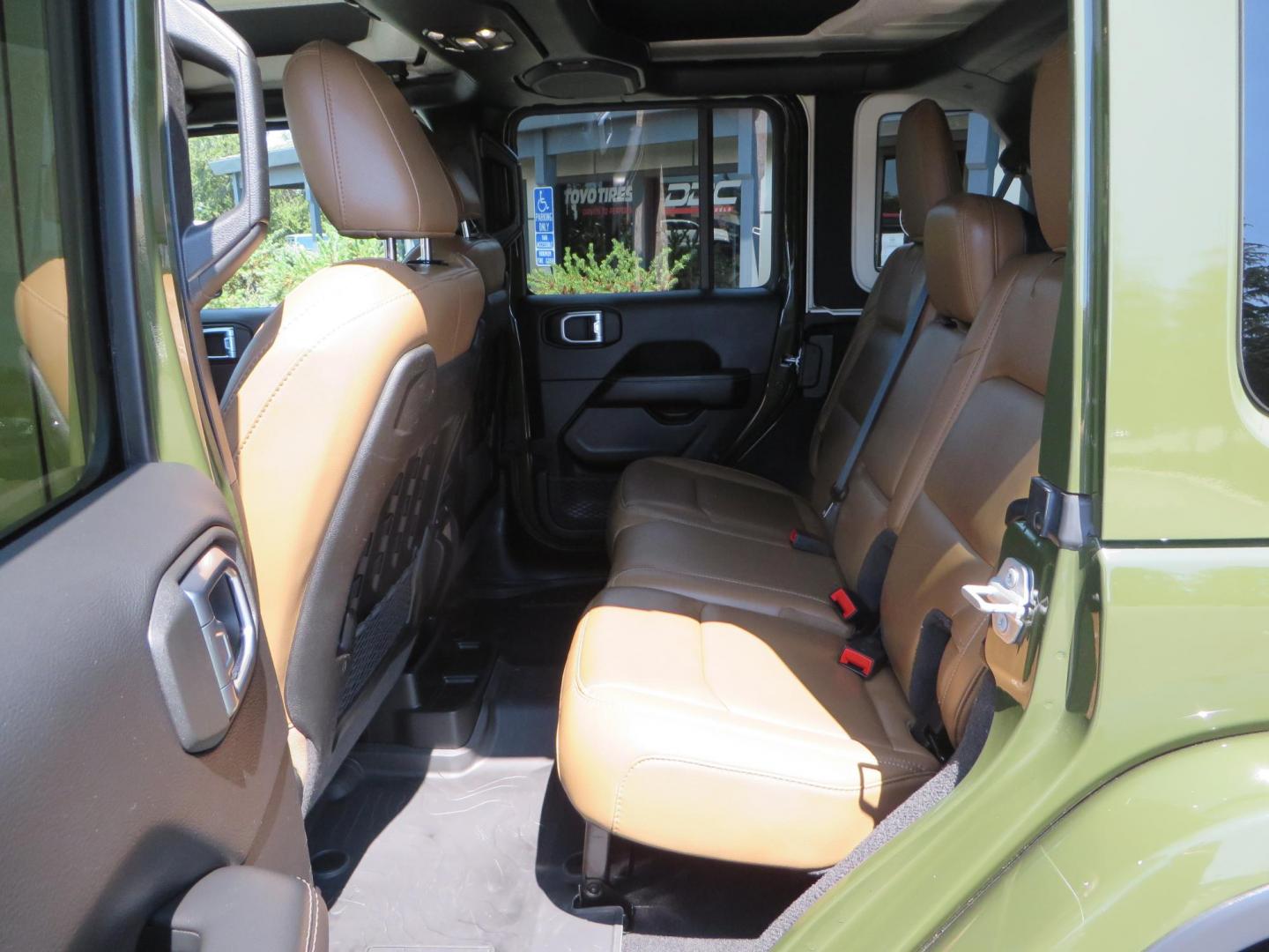 2021 Green Jeep Wrangler Unlimited Rubicon (1C4JJXFM1MW) with an 3.0L V6 DOHC 24V TURBO DIESEL engine, 6A transmission, located at 2630 Grass Valley Highway, Auburn, CA, 95603, (530) 508-5100, 38.937893, -121.095482 - Mopar lifted Diesel Rubicon with Fox shocks, HD tire carrier, Amp Power steps, Roof Rack, and color matched simulated beadlock rings. - Photo#45
