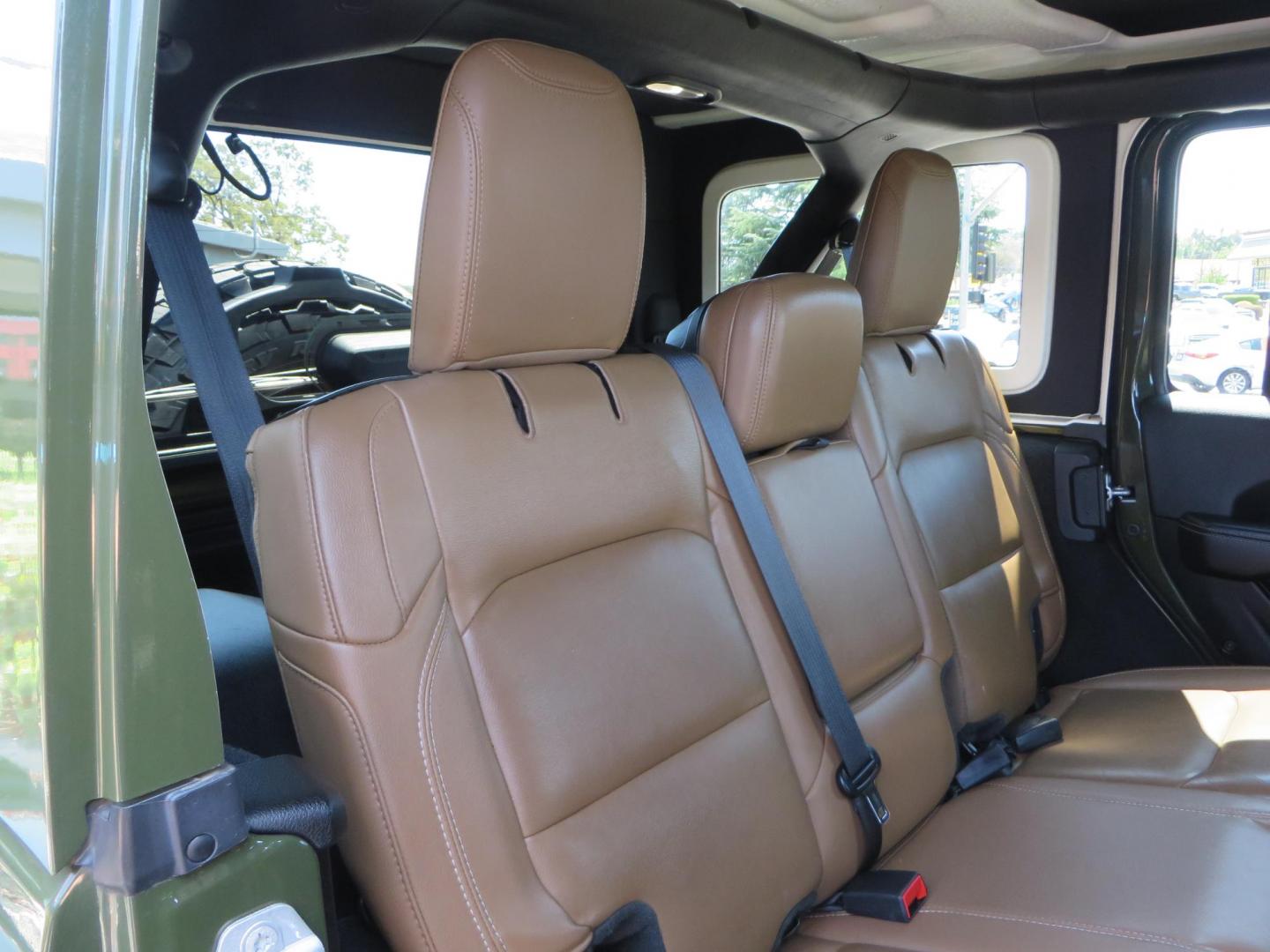 2021 Green Jeep Wrangler Unlimited Rubicon (1C4JJXFM1MW) with an 3.0L V6 DOHC 24V TURBO DIESEL engine, 6A transmission, located at 2630 Grass Valley Highway, Auburn, CA, 95603, (530) 508-5100, 38.937893, -121.095482 - Mopar lifted Diesel Rubicon with Fox shocks, HD tire carrier, Amp Power steps, Roof Rack, and color matched simulated beadlock rings. - Photo#60