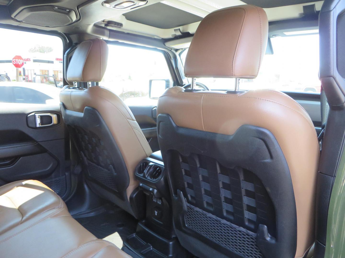 2021 Green Jeep Wrangler Unlimited Rubicon (1C4JJXFM1MW) with an 3.0L V6 DOHC 24V TURBO DIESEL engine, 6A transmission, located at 2630 Grass Valley Highway, Auburn, CA, 95603, (530) 508-5100, 38.937893, -121.095482 - Mopar lifted Diesel Rubicon with Fox shocks, HD tire carrier, Amp Power steps, Roof Rack, and color matched simulated beadlock rings. - Photo#62