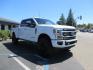 2022 White /BLACK Ford F-350 SD Platinum Crew Cab 4WD (1FT8W3BT2NE) with an 6.7L V8 OHV 16V DIESEL engine, 6A transmission, located at 2630 Grass Valley Highway, Auburn, CA, 95603, (530) 508-5100, 38.937893, -121.095482 - Features a BDS 2" level kit, Fox shocks, 18" Method MR323 wheels, 37" Toyo RT Pro tires, UWS tool box, folding bedcover. - Photo#6