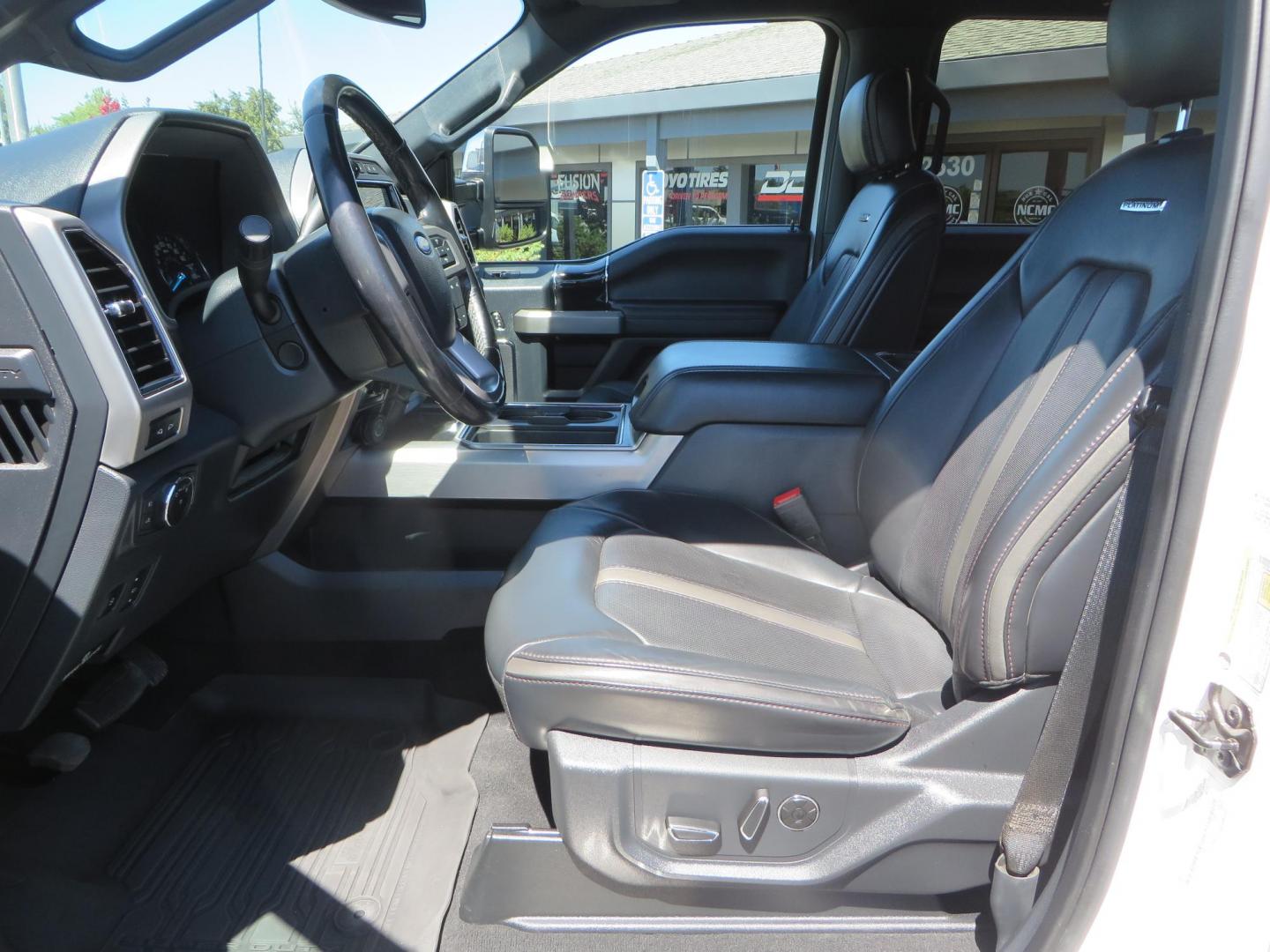 2022 White /BLACK Ford F-350 SD Platinum Crew Cab 4WD (1FT8W3BT2NE) with an 6.7L V8 OHV 16V DIESEL engine, 6A transmission, located at 2630 Grass Valley Highway, Auburn, CA, 95603, (530) 508-5100, 38.937893, -121.095482 - Features a BDS 2" level kit, Fox shocks, 18" Method MR323 wheels, 37" Toyo RT Pro tires, UWS tool box, folding bedcover. - Photo#22