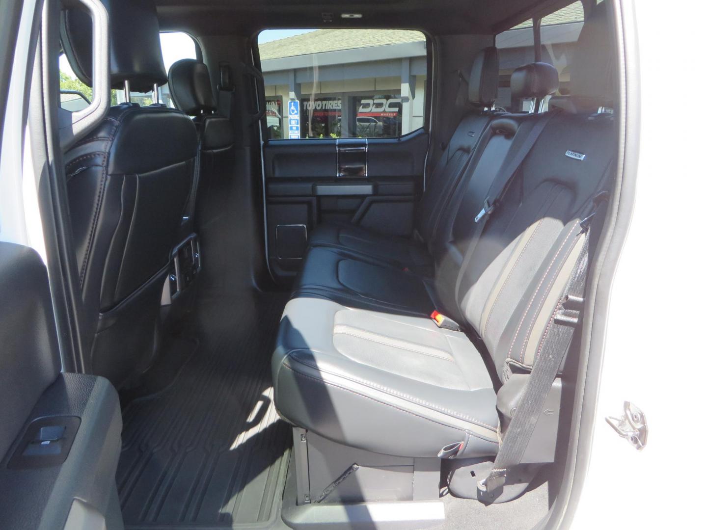 2022 White /BLACK Ford F-350 SD Platinum Crew Cab 4WD (1FT8W3BT2NE) with an 6.7L V8 OHV 16V DIESEL engine, 6A transmission, located at 2630 Grass Valley Highway, Auburn, CA, 95603, (530) 508-5100, 38.937893, -121.095482 - Features a BDS 2" level kit, Fox shocks, 18" Method MR323 wheels, 37" Toyo RT Pro tires, UWS tool box, folding bedcover. - Photo#52