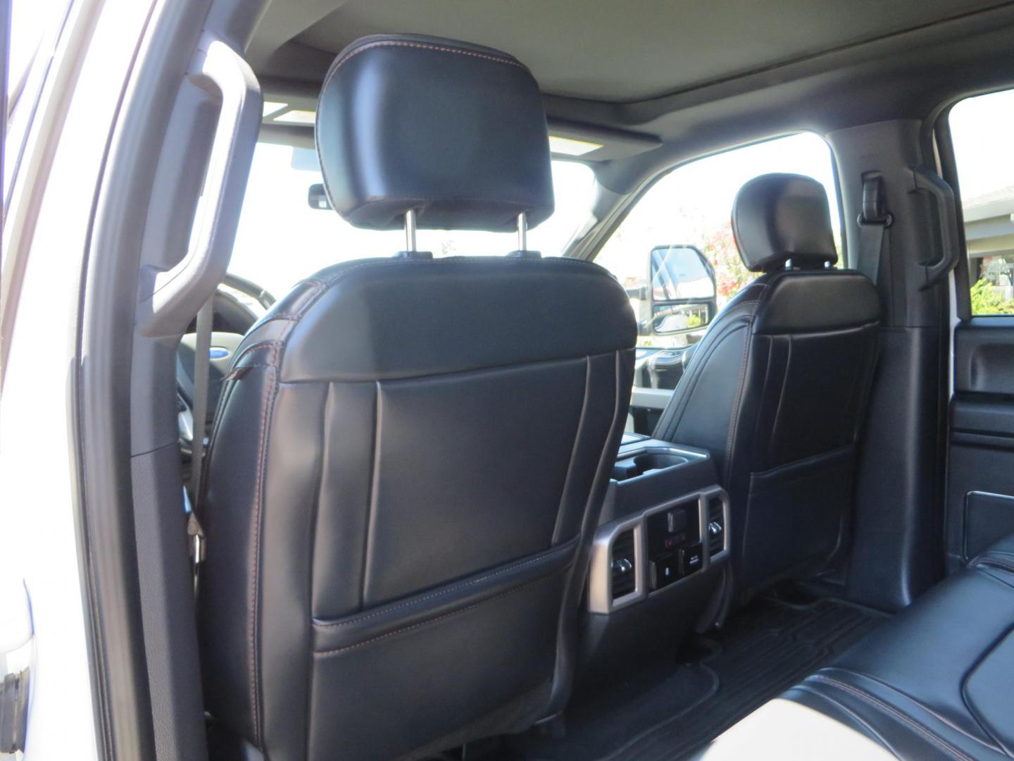 2022 White /BLACK Ford F-350 SD Platinum Crew Cab 4WD (1FT8W3BT2NE) with an 6.7L V8 OHV 16V DIESEL engine, 6A transmission, located at 2630 Grass Valley Highway, Auburn, CA, 95603, (530) 508-5100, 38.937893, -121.095482 - Features a BDS 2" level kit, Fox shocks, 18" Method MR323 wheels, 37" Toyo RT Pro tires, UWS tool box, folding bedcover. - Photo#55