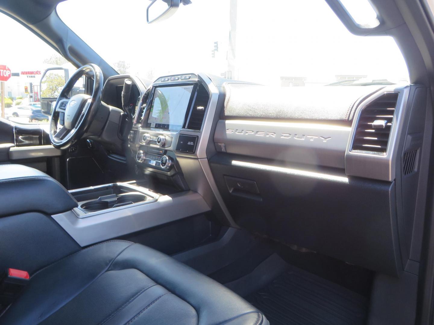 2022 White /BLACK Ford F-350 SD Platinum Crew Cab 4WD (1FT8W3BT2NE) with an 6.7L V8 OHV 16V DIESEL engine, 6A transmission, located at 2630 Grass Valley Highway, Auburn, CA, 95603, (530) 508-5100, 38.937893, -121.095482 - Features a BDS 2" level kit, Fox shocks, 18" Method MR323 wheels, 37" Toyo RT Pro tires, UWS tool box, folding bedcover. - Photo#63