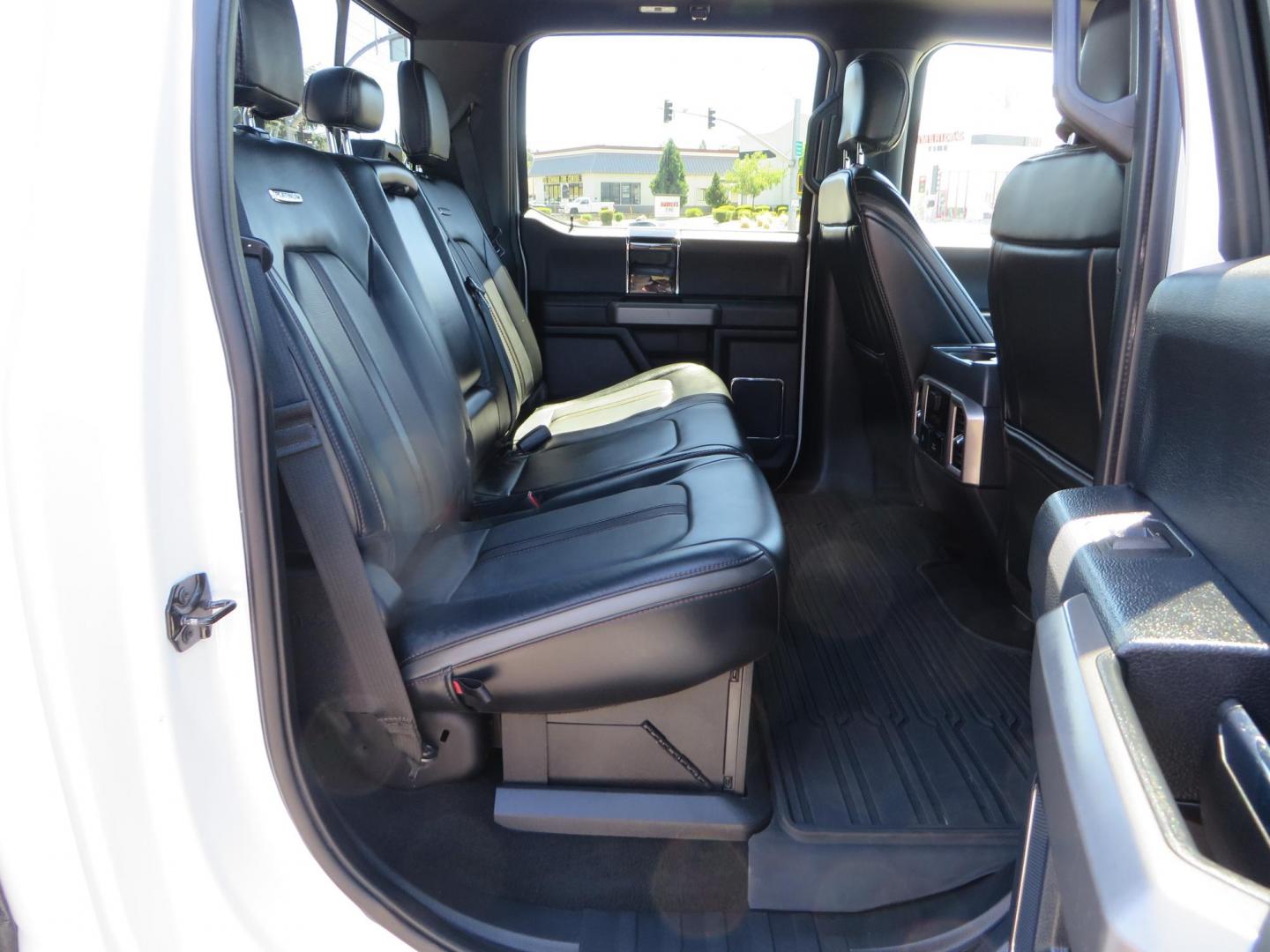 2022 White /BLACK Ford F-350 SD Platinum Crew Cab 4WD (1FT8W3BT2NE) with an 6.7L V8 OHV 16V DIESEL engine, 6A transmission, located at 2630 Grass Valley Highway, Auburn, CA, 95603, (530) 508-5100, 38.937893, -121.095482 - Features a BDS 2" level kit, Fox shocks, 18" Method MR323 wheels, 37" Toyo RT Pro tires, UWS tool box, folding bedcover. - Photo#66