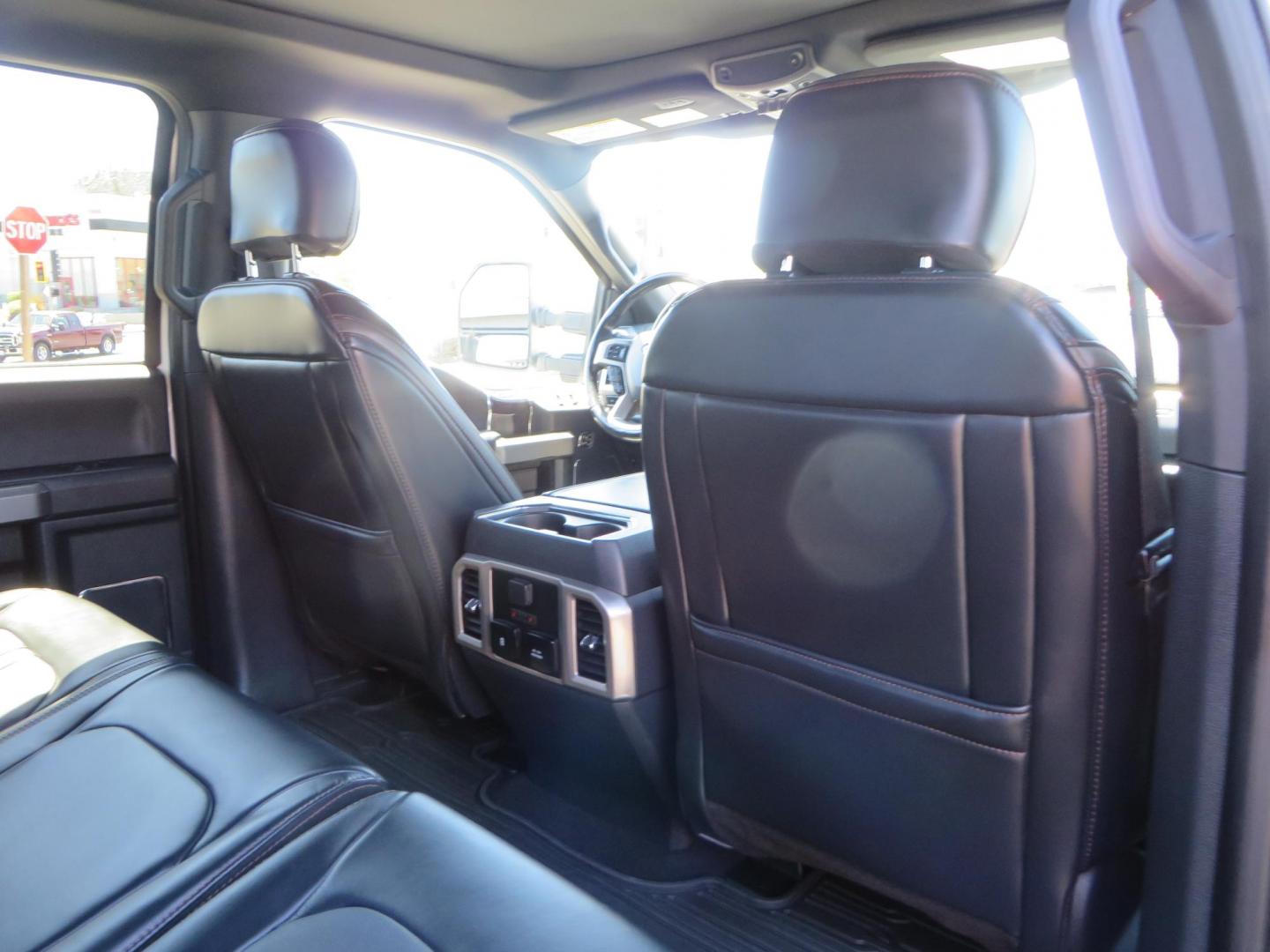 2022 White /BLACK Ford F-350 SD Platinum Crew Cab 4WD (1FT8W3BT2NE) with an 6.7L V8 OHV 16V DIESEL engine, 6A transmission, located at 2630 Grass Valley Highway, Auburn, CA, 95603, (530) 508-5100, 38.937893, -121.095482 - Features a BDS 2" level kit, Fox shocks, 18" Method MR323 wheels, 37" Toyo RT Pro tires, UWS tool box, folding bedcover. - Photo#69