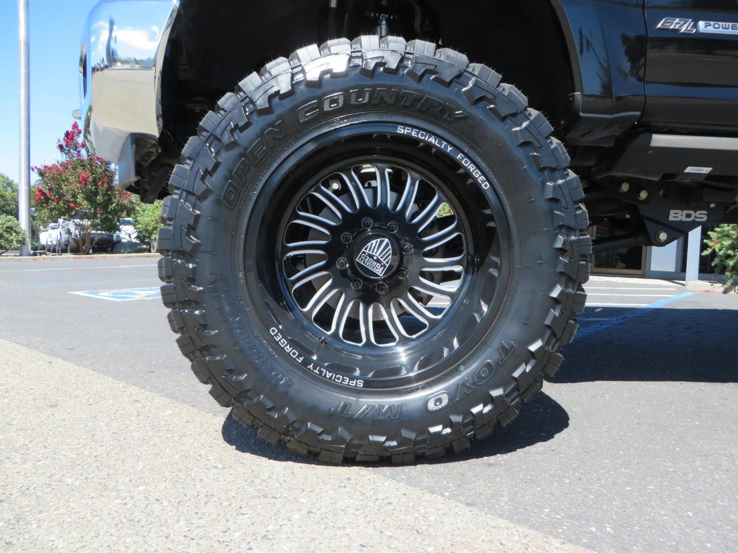 2017 BLACK /Brown Ford F-250 SD King Ranch Crew Cab 4WD (1FT7W2BT5HE) with an 6.7L V8 OHV 16V DIESEL engine, 6A transmission, located at 2630 Grass Valley Highway, Auburn, CA, 95603, (530) 508-5100, 38.937893, -121.095482 - Monster Superduty sitting on an 8" BDS long arm Fox 2.5 Coilover suspension system, Fox 2.0 shocks, Fox dual steering stabilizers, 22" Specialty Forged wheels, 40" Toyo MT tires, Undercover Ultraflex tonneau cover, 15" Drop Gen-Y hitch, and window tint. - Photo#8
