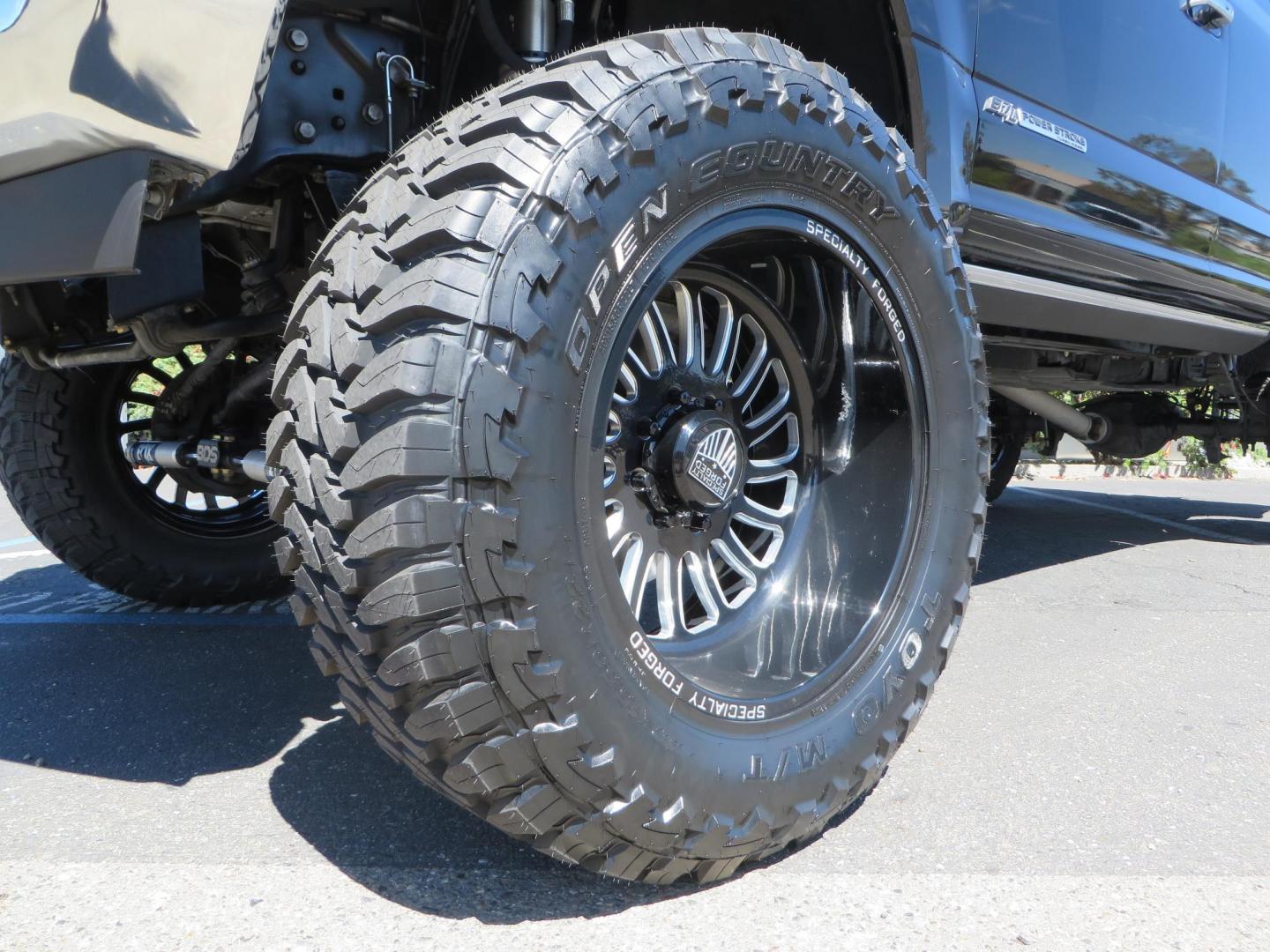 2017 BLACK /Brown Ford F-250 SD King Ranch Crew Cab 4WD (1FT7W2BT5HE) with an 6.7L V8 OHV 16V DIESEL engine, 6A transmission, located at 2630 Grass Valley Highway, Auburn, CA, 95603, (530) 508-5100, 38.937893, -121.095482 - Monster Superduty sitting on an 8" BDS long arm Fox 2.5 Coilover suspension system, Fox 2.0 shocks, Fox dual steering stabilizers, 22" Specialty Forged wheels, 40" Toyo MT tires, Undercover Ultraflex tonneau cover, 15" Drop Gen-Y hitch, and window tint. - Photo#9