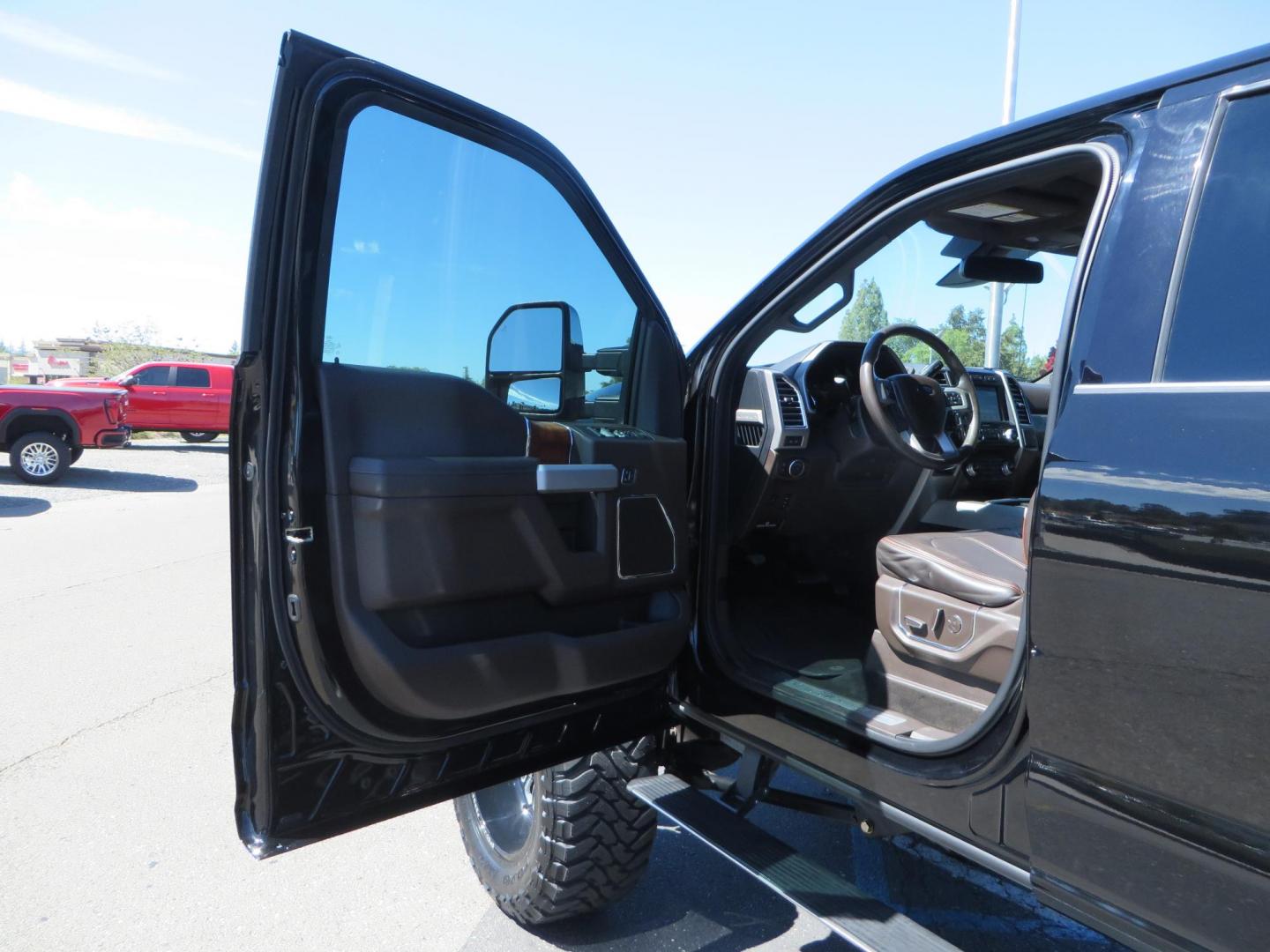 2017 BLACK /Brown Ford F-250 SD King Ranch Crew Cab 4WD (1FT7W2BT5HE) with an 6.7L V8 OHV 16V DIESEL engine, 6A transmission, located at 2630 Grass Valley Highway, Auburn, CA, 95603, (530) 508-5100, 38.937893, -121.095482 - Monster Superduty sitting on an 8" BDS long arm Fox 2.5 Coilover suspension system, Fox 2.0 shocks, Fox dual steering stabilizers, 22" Specialty Forged wheels, 40" Toyo MT tires, Undercover Ultraflex tonneau cover, 15" Drop Gen-Y hitch, and window tint. - Photo#24
