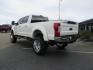 2019 White /Black Ford F-250 SD Lariat Crew Cab Short Bed 4WD (1FT7W2BT2KE) with an 6.7L V8 OHV 16V DIESEL engine, 6A transmission, located at 2630 Grass Valley Highway, Auburn, CA, 95603, (530) 508-5100, 38.937893, -121.095482 - Features a Fabtech 6" 4 link Lift kit, Fox remote reservoir shocks, 37" RBP MT tires, 22" Hostile wheels, Bushwacker Fender flares, Undercover Ultraflex bedcover, and window tint. - Photo#2