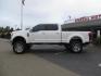2019 White /Black Ford F-250 SD Lariat Crew Cab Short Bed 4WD (1FT7W2BT2KE) with an 6.7L V8 OHV 16V DIESEL engine, 6A transmission, located at 2630 Grass Valley Highway, Auburn, CA, 95603, (530) 508-5100, 38.937893, -121.095482 - Features a Fabtech 6" 4 link Lift kit, Fox remote reservoir shocks, 37" RBP MT tires, 22" Hostile wheels, Bushwacker Fender flares, Undercover Ultraflex bedcover, and window tint. - Photo#1
