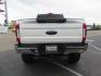 2019 White /Black Ford F-250 SD Lariat Crew Cab Short Bed 4WD (1FT7W2BT2KE) with an 6.7L V8 OHV 16V DIESEL engine, 6A transmission, located at 2630 Grass Valley Highway, Auburn, CA, 95603, (530) 508-5100, 38.937893, -121.095482 - Features a Fabtech 6" 4 link Lift kit, Fox remote reservoir shocks, 37" RBP MT tires, 22" Hostile wheels, Bushwacker Fender flares, Undercover Ultraflex bedcover, and window tint. - Photo#3