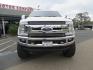 2019 White /Black Ford F-250 SD Lariat Crew Cab Short Bed 4WD (1FT7W2BT2KE) with an 6.7L V8 OHV 16V DIESEL engine, 6A transmission, located at 2630 Grass Valley Highway, Auburn, CA, 95603, (530) 508-5100, 38.937893, -121.095482 - Features a Fabtech 6" 4 link Lift kit, Fox remote reservoir shocks, 37" RBP MT tires, 22" Hostile wheels, Bushwacker Fender flares, Undercover Ultraflex bedcover, and window tint. - Photo#7