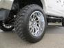 2019 White /Black Ford F-250 SD Lariat Crew Cab Short Bed 4WD (1FT7W2BT2KE) with an 6.7L V8 OHV 16V DIESEL engine, 6A transmission, located at 2630 Grass Valley Highway, Auburn, CA, 95603, (530) 508-5100, 38.937893, -121.095482 - Features a Fabtech 6" 4 link Lift kit, Fox remote reservoir shocks, 37" RBP MT tires, 22" Hostile wheels, Bushwacker Fender flares, Undercover Ultraflex bedcover, and window tint. - Photo#9