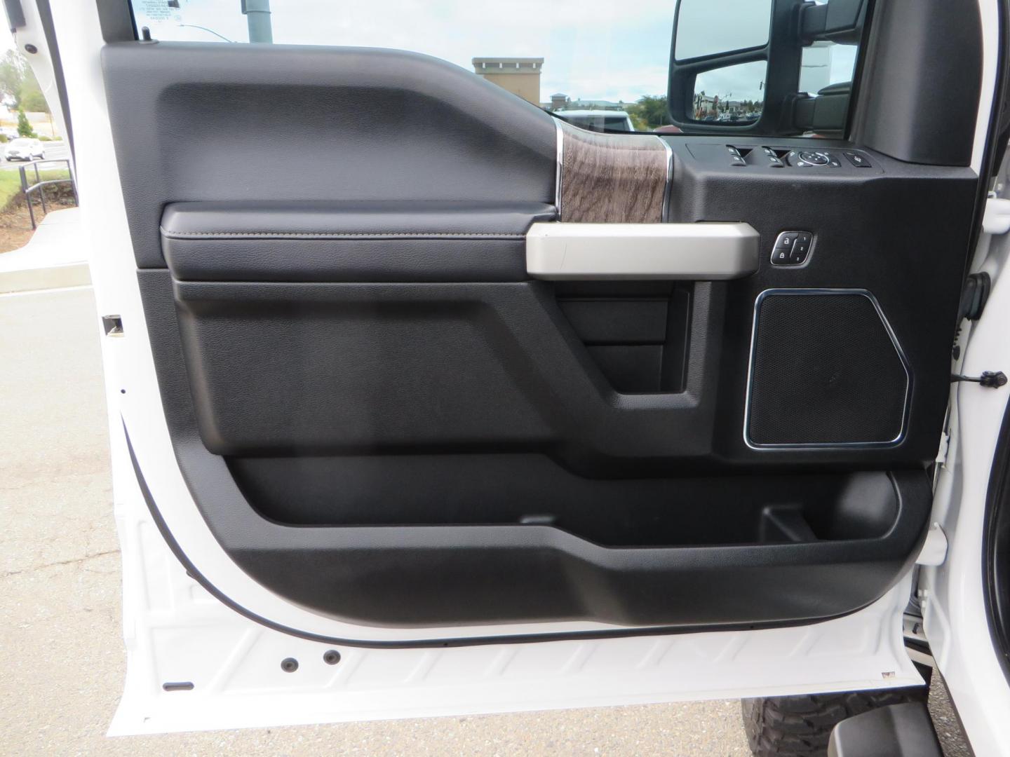 2019 White /Black Ford F-250 SD Lariat Crew Cab Short Bed 4WD (1FT7W2BT2KE) with an 6.7L V8 OHV 16V DIESEL engine, 6A transmission, located at 2630 Grass Valley Highway, Auburn, CA, 95603, (530) 508-5100, 38.937893, -121.095482 - Features a Fabtech 6" 4 link Lift kit, Fox remote reservoir shocks, 37" RBP MT tires, 22" Hostile wheels, Bushwacker Fender flares, Undercover Ultraflex bedcover, and window tint. - Photo#25