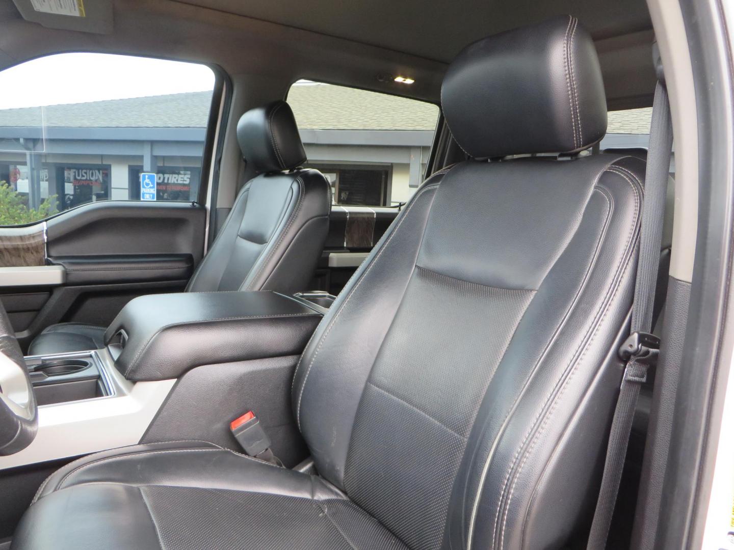 2019 White /Black Ford F-250 SD Lariat Crew Cab Short Bed 4WD (1FT7W2BT2KE) with an 6.7L V8 OHV 16V DIESEL engine, 6A transmission, located at 2630 Grass Valley Highway, Auburn, CA, 95603, (530) 508-5100, 38.937893, -121.095482 - Features a Fabtech 6" 4 link Lift kit, Fox remote reservoir shocks, 37" RBP MT tires, 22" Hostile wheels, Bushwacker Fender flares, Undercover Ultraflex bedcover, and window tint. - Photo#28
