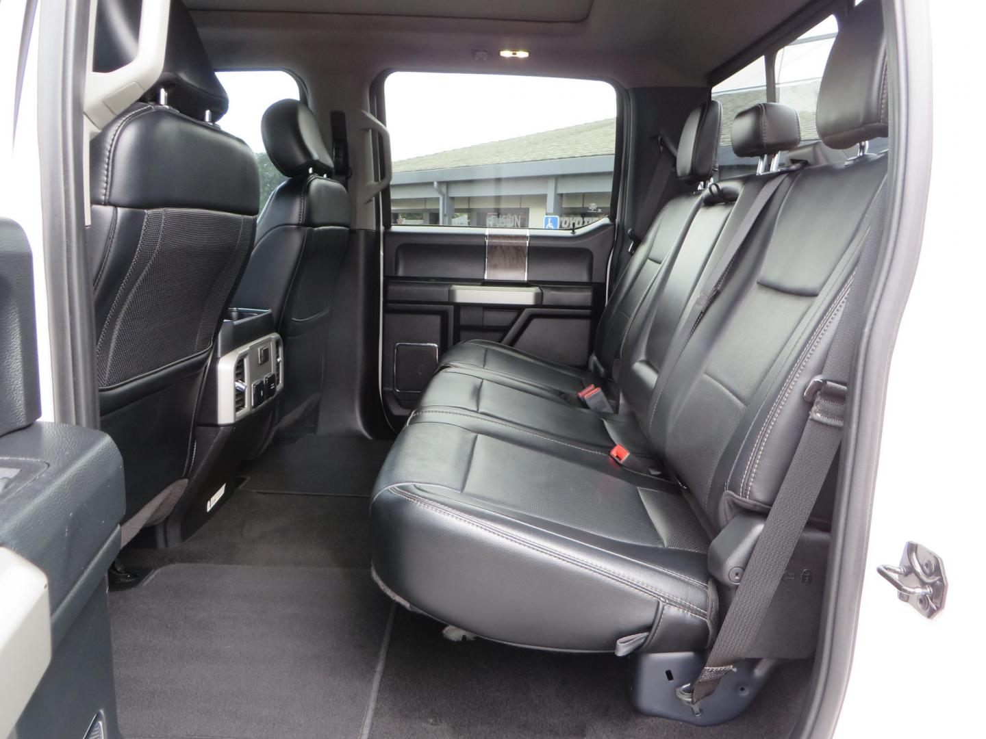 2019 White /Black Ford F-250 SD Lariat Crew Cab Short Bed 4WD (1FT7W2BT2KE) with an 6.7L V8 OHV 16V DIESEL engine, 6A transmission, located at 2630 Grass Valley Highway, Auburn, CA, 95603, (530) 508-5100, 38.937893, -121.095482 - Features a Fabtech 6" 4 link Lift kit, Fox remote reservoir shocks, 37" RBP MT tires, 22" Hostile wheels, Bushwacker Fender flares, Undercover Ultraflex bedcover, and window tint. - Photo#55