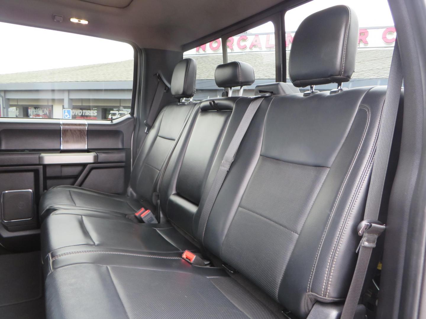 2019 White /Black Ford F-250 SD Lariat Crew Cab Short Bed 4WD (1FT7W2BT2KE) with an 6.7L V8 OHV 16V DIESEL engine, 6A transmission, located at 2630 Grass Valley Highway, Auburn, CA, 95603, (530) 508-5100, 38.937893, -121.095482 - Features a Fabtech 6" 4 link Lift kit, Fox remote reservoir shocks, 37" RBP MT tires, 22" Hostile wheels, Bushwacker Fender flares, Undercover Ultraflex bedcover, and window tint. - Photo#56
