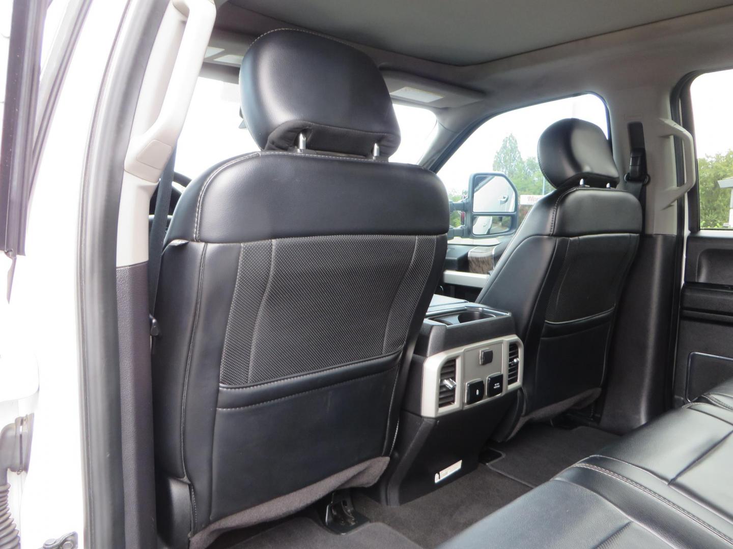 2019 White /Black Ford F-250 SD Lariat Crew Cab Short Bed 4WD (1FT7W2BT2KE) with an 6.7L V8 OHV 16V DIESEL engine, 6A transmission, located at 2630 Grass Valley Highway, Auburn, CA, 95603, (530) 508-5100, 38.937893, -121.095482 - Features a Fabtech 6" 4 link Lift kit, Fox remote reservoir shocks, 37" RBP MT tires, 22" Hostile wheels, Bushwacker Fender flares, Undercover Ultraflex bedcover, and window tint. - Photo#58