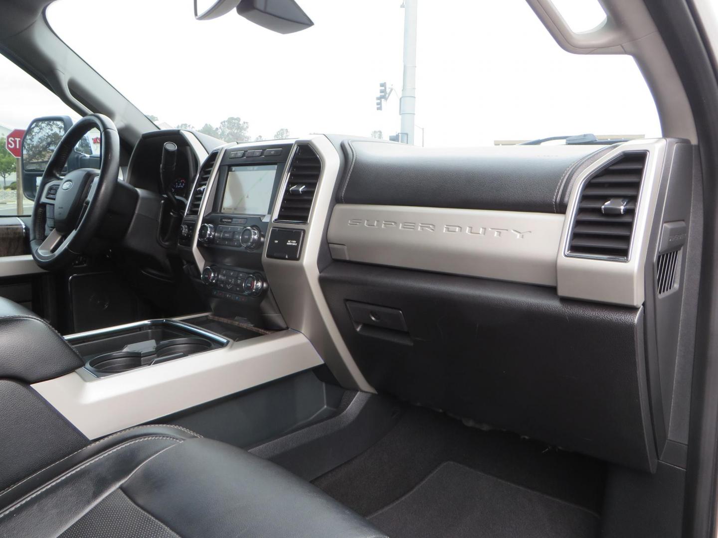 2019 White /Black Ford F-250 SD Lariat Crew Cab Short Bed 4WD (1FT7W2BT2KE) with an 6.7L V8 OHV 16V DIESEL engine, 6A transmission, located at 2630 Grass Valley Highway, Auburn, CA, 95603, (530) 508-5100, 38.937893, -121.095482 - Features a Fabtech 6" 4 link Lift kit, Fox remote reservoir shocks, 37" RBP MT tires, 22" Hostile wheels, Bushwacker Fender flares, Undercover Ultraflex bedcover, and window tint. - Photo#67
