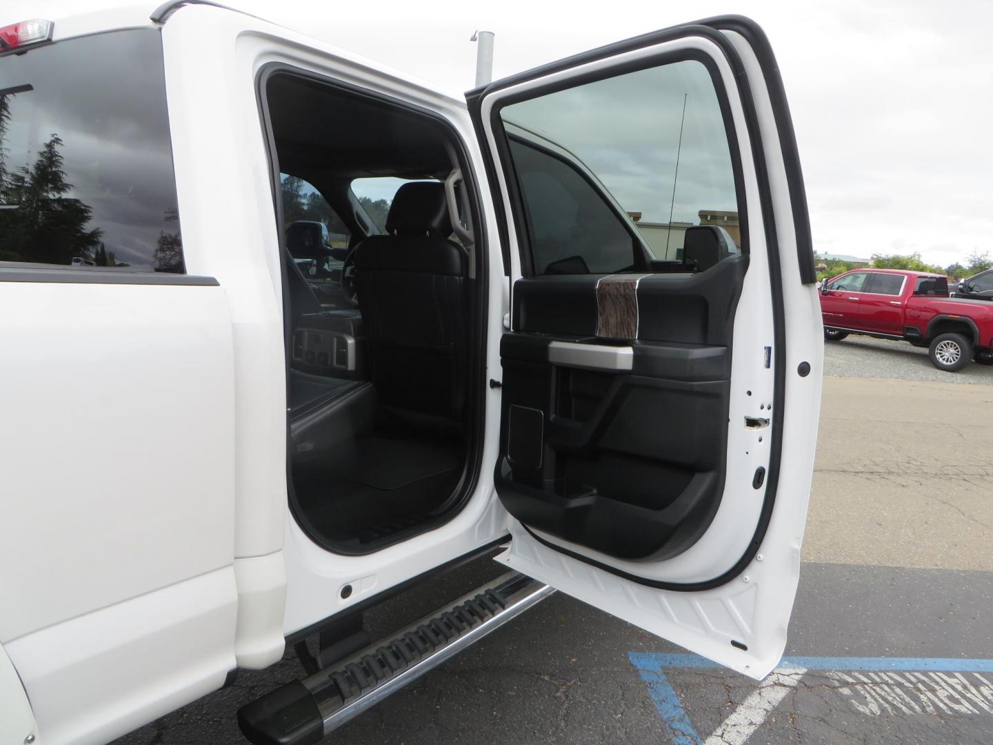 2019 White /Black Ford F-250 SD Lariat Crew Cab Short Bed 4WD (1FT7W2BT2KE) with an 6.7L V8 OHV 16V DIESEL engine, 6A transmission, located at 2630 Grass Valley Highway, Auburn, CA, 95603, (530) 508-5100, 38.937893, -121.095482 - Features a Fabtech 6" 4 link Lift kit, Fox remote reservoir shocks, 37" RBP MT tires, 22" Hostile wheels, Bushwacker Fender flares, Undercover Ultraflex bedcover, and window tint. - Photo#68