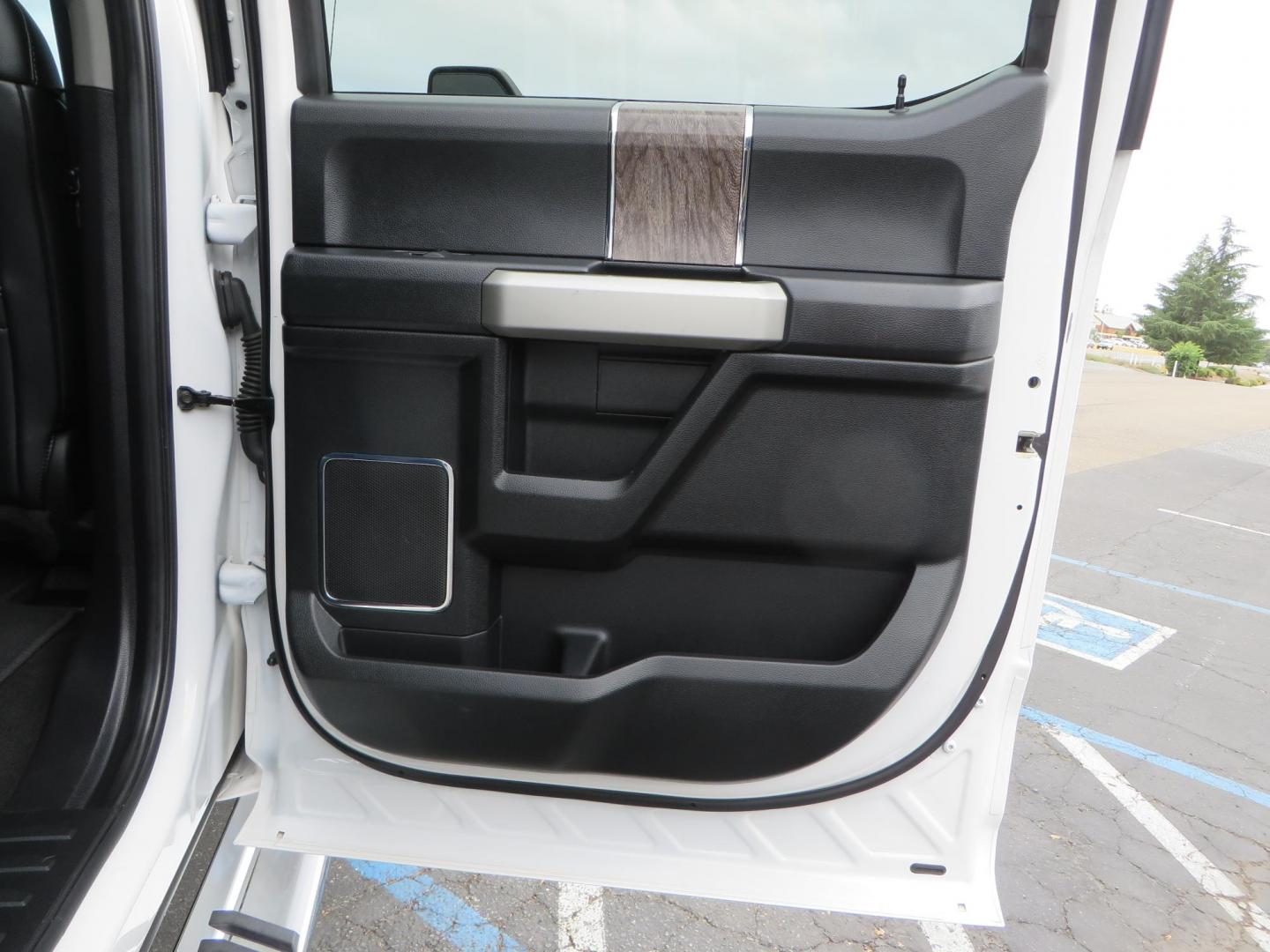 2019 White /Black Ford F-250 SD Lariat Crew Cab Short Bed 4WD (1FT7W2BT2KE) with an 6.7L V8 OHV 16V DIESEL engine, 6A transmission, located at 2630 Grass Valley Highway, Auburn, CA, 95603, (530) 508-5100, 38.937893, -121.095482 - Features a Fabtech 6" 4 link Lift kit, Fox remote reservoir shocks, 37" RBP MT tires, 22" Hostile wheels, Bushwacker Fender flares, Undercover Ultraflex bedcover, and window tint. - Photo#69