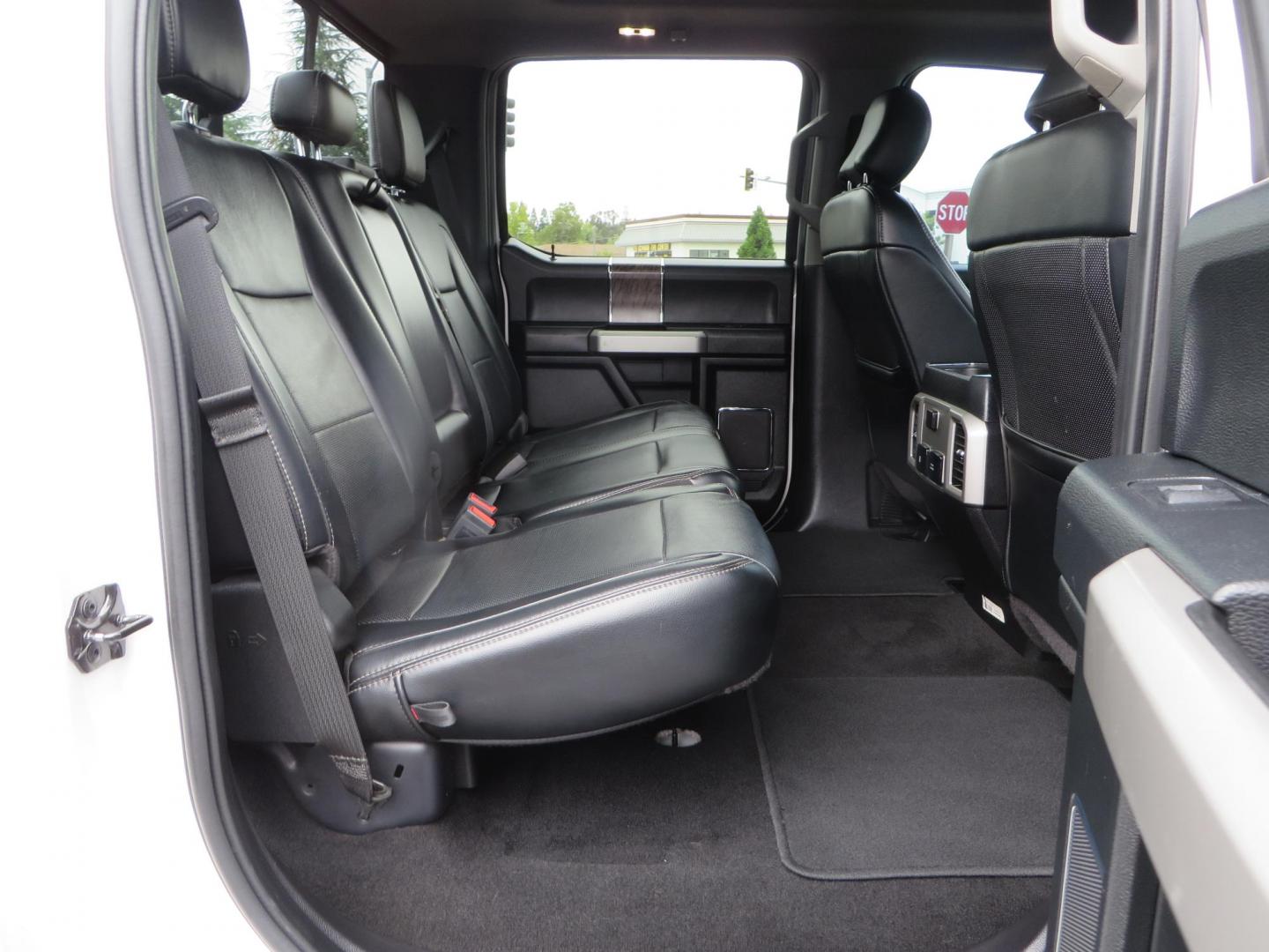 2019 White /Black Ford F-250 SD Lariat Crew Cab Short Bed 4WD (1FT7W2BT2KE) with an 6.7L V8 OHV 16V DIESEL engine, 6A transmission, located at 2630 Grass Valley Highway, Auburn, CA, 95603, (530) 508-5100, 38.937893, -121.095482 - Features a Fabtech 6" 4 link Lift kit, Fox remote reservoir shocks, 37" RBP MT tires, 22" Hostile wheels, Bushwacker Fender flares, Undercover Ultraflex bedcover, and window tint. - Photo#70