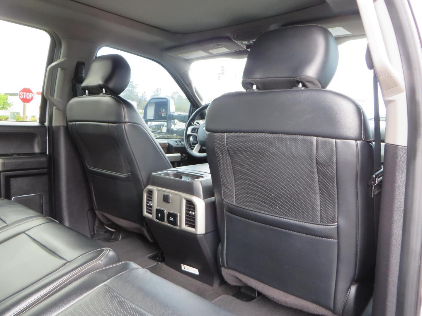 2019 White /Black Ford F-250 SD Lariat Crew Cab Short Bed 4WD (1FT7W2BT2KE) with an 6.7L V8 OHV 16V DIESEL engine, 6A transmission, located at 2630 Grass Valley Highway, Auburn, CA, 95603, (530) 508-5100, 38.937893, -121.095482 - Features a Fabtech 6" 4 link Lift kit, Fox remote reservoir shocks, 37" RBP MT tires, 22" Hostile wheels, Bushwacker Fender flares, Undercover Ultraflex bedcover, and window tint. - Photo#73